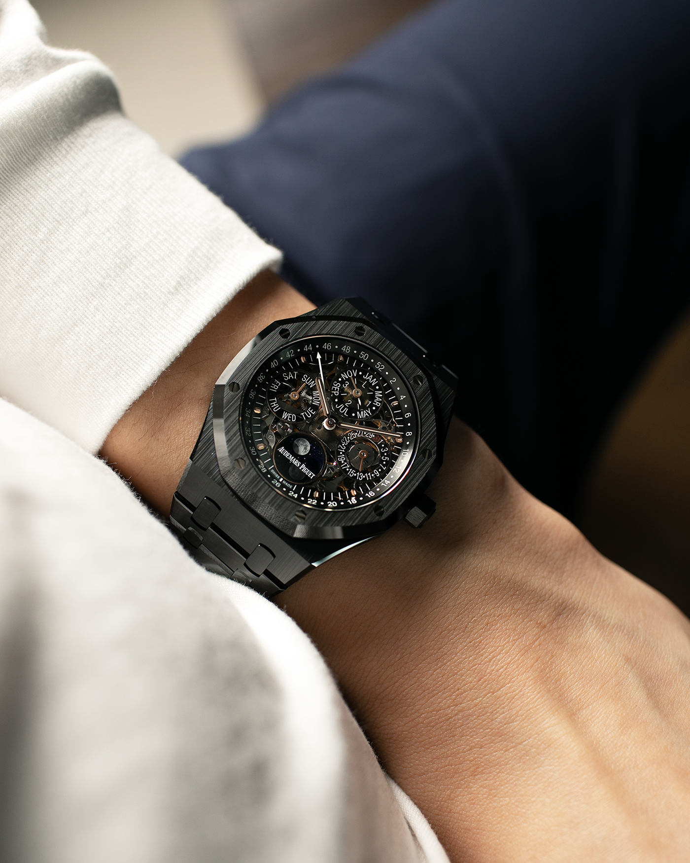 Brand: Audemars Piguet Year: 2021 Model: Royal Oak Perpetual Calendar Openworked, Boutique-only Edition Reference Number: 26585CE Material: Ceramic Movement: Audemars Piguet Cal. 5135, Self-Winding Case Dimensions: 41mm x 9.9mm Bracelet: Audemars Piguet Integrated Black Ceramic Bracelet with Signed Titanium Clasp