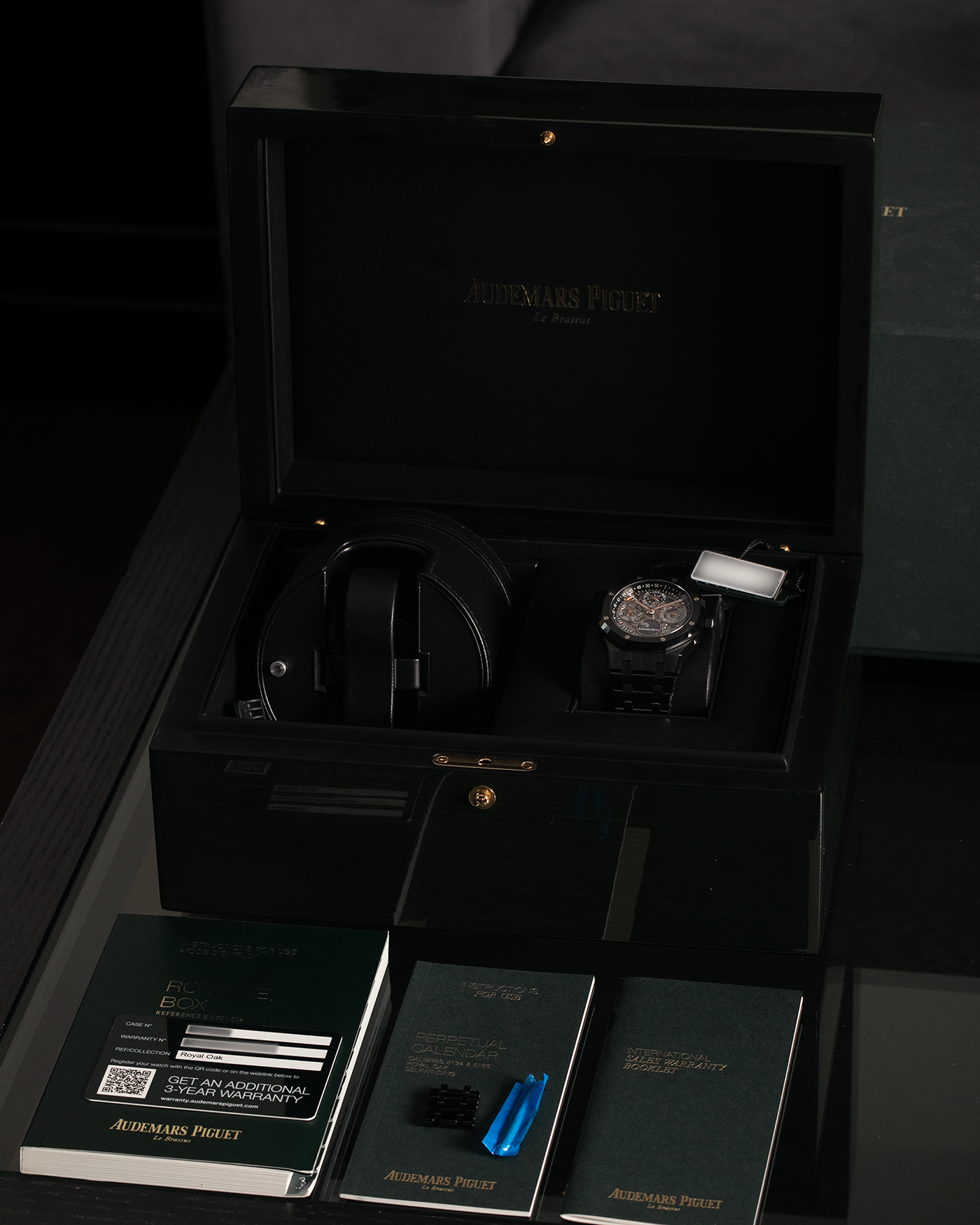 Brand: Audemars Piguet Year: 2021 Model: Royal Oak Perpetual Calendar Openworked, Boutique-only Edition Reference Number: 26585CE Material: Ceramic Movement: Audemars Piguet Cal. 5135, Self-Winding Case Dimensions: 41mm x 9.9mm Bracelet: Audemars Piguet Integrated Black Ceramic Bracelet with Signed Titanium Clasp