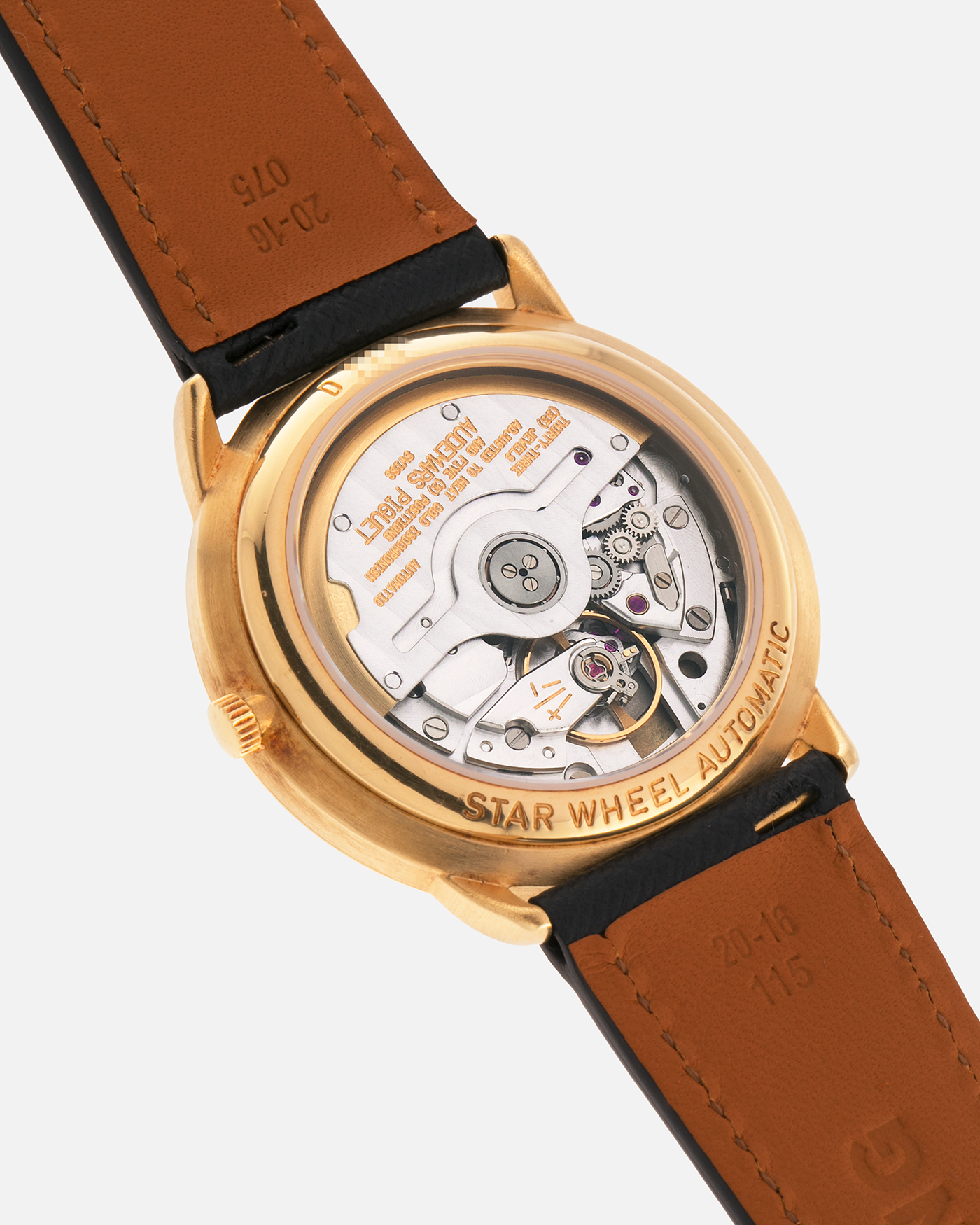 Brand: Audemars Piguet
Year: 1990’s
Model: Star Wheel
Reference Number: 25720BA
Material: 18-carat Yellow Gold 
Movement: AP Cal. 2224, Self-Winding
Case Diameter: 36mm
Strap: Molequin Navy Blue Textured Calf Leather Strap with 18-carat Yellow Gold Audemars Piguet Tang Buckle