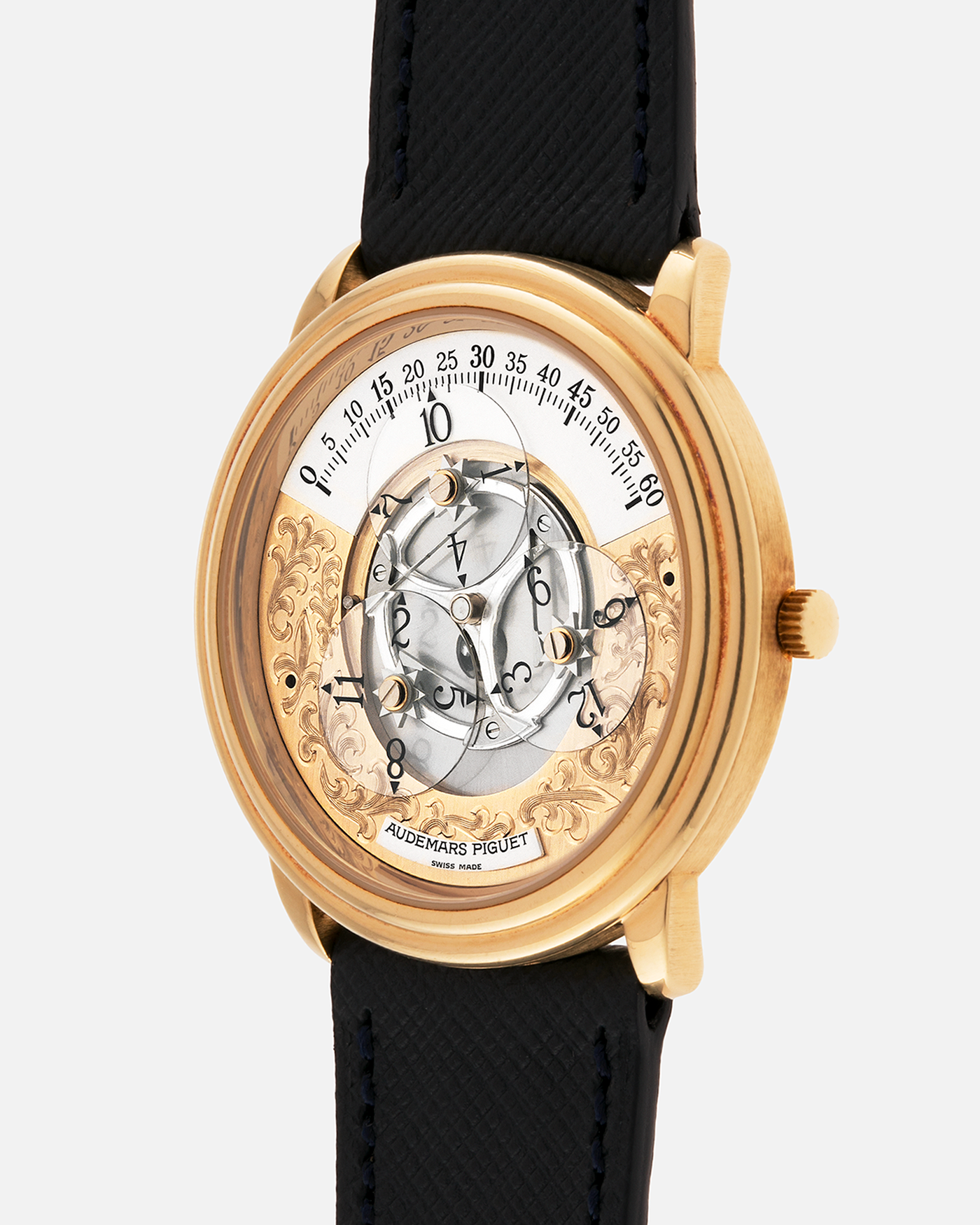 Brand: Audemars Piguet
Year: 1990’s
Model: Star Wheel
Reference Number: 25720BA
Material: 18-carat Yellow Gold 
Movement: AP Cal. 2224, Self-Winding
Case Diameter: 36mm
Strap: Molequin Navy Blue Textured Calf Leather Strap with 18-carat Yellow Gold Audemars Piguet Tang Buckle