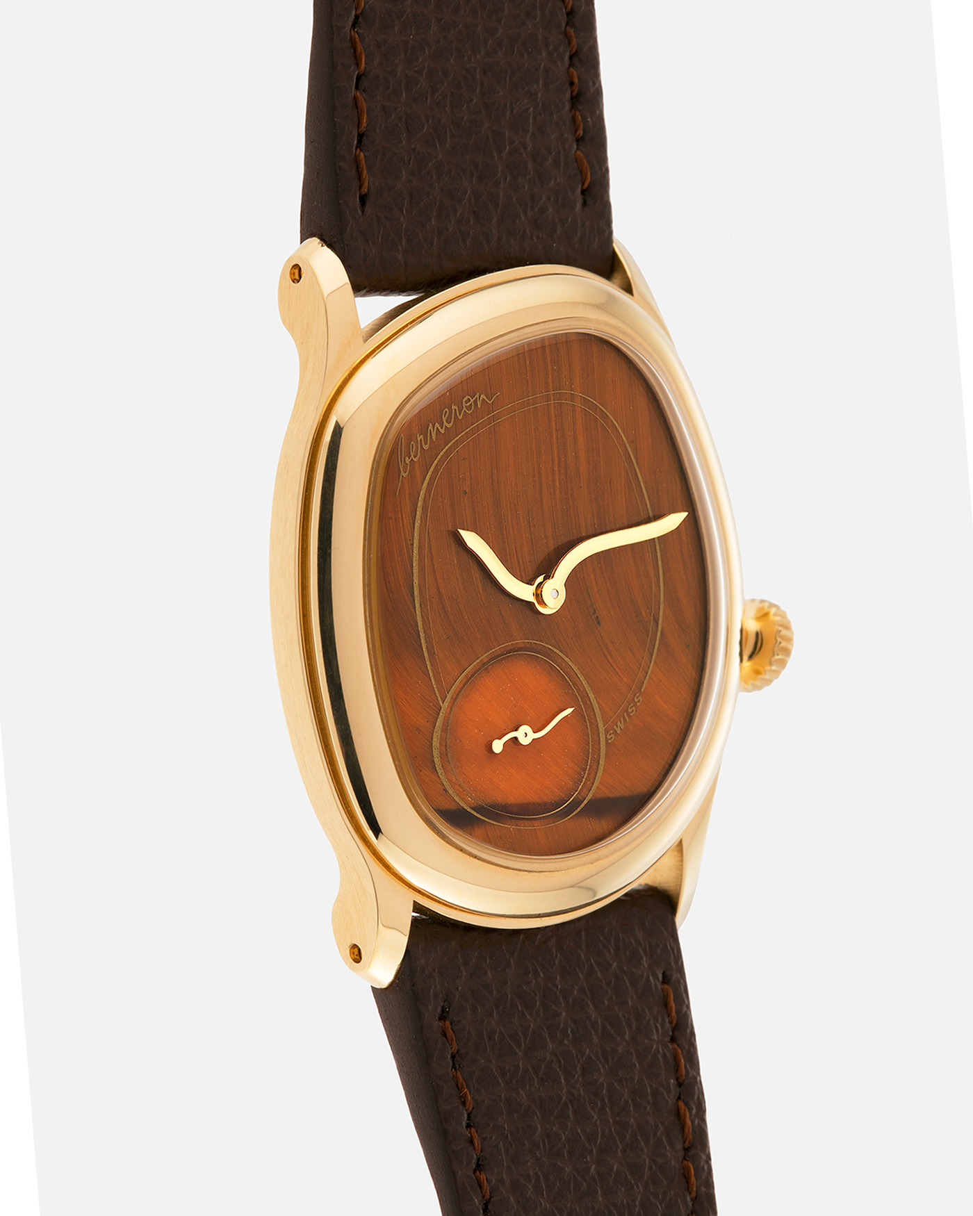 Brand: Berneron
Year: 2025
Model: Mirage 34 Tiger Eye
Reference Number: 3034MS.G23
Material: 18k Yellow Gold
Movement: In-House, Manually-Wound Cal. 215
Case Dimensions: 34mm X 30mm (7mm Thickness)
Strap: Berneron Red Brown Barenia Leather Strap and Berneron 18k Yellow Gold Tang Buckle