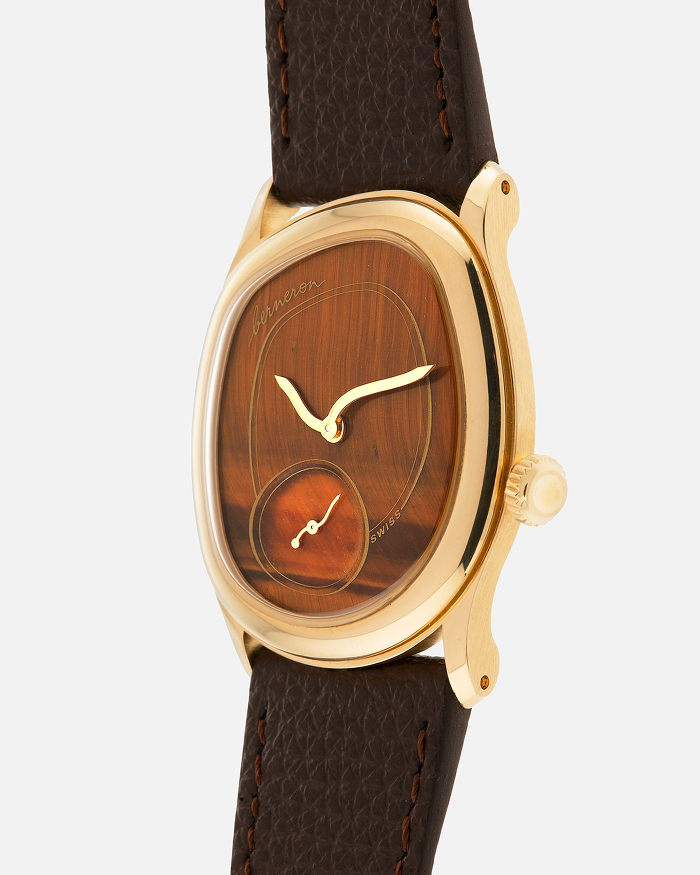Brand: Berneron
Year: 2025
Model: Mirage 34 Tiger Eye
Reference Number: 3034MS.G23
Material: 18k Yellow Gold
Movement: In-House, Manually-Wound Cal. 215
Case Dimensions: 34mm X 30mm (7mm Thickness)
Strap: Berneron Red Brown Barenia Leather Strap and Berneron 18k Yellow Gold Tang Buckle