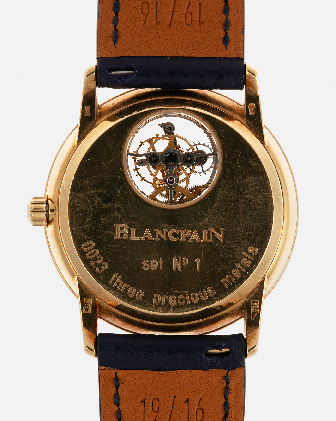 Brand: Blancpain
Year: 1996
Model: Villeret Flying Tourbillon 8 Days, Limited to 99 Pieces Across all Metals
Reference: 0023-1418-55
Material: 18-carat Yellow Gold
Movement: Blancpain Cal. 23, Manual-Winding Flying Tourbillon
Case Dimensions: 34mm x 7.4mm (Lug-to-Lug 40mm)
Lug Width: 19mm
Strap: Nostime Dark Navy Textured Calf Leather Strap with Signed 18-carat Tang Buckle, with extra used Blancpain Black Alligator Leather Strap