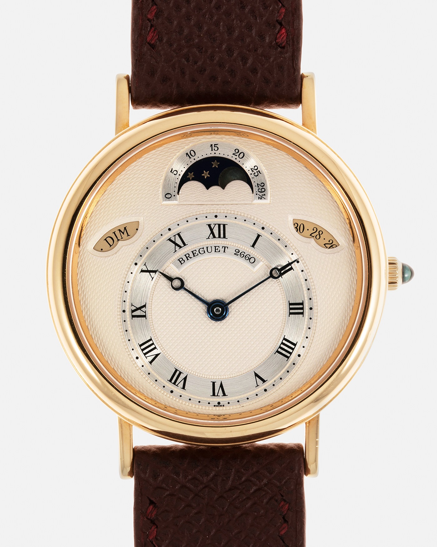 Brand: Breguet Year: 1990’s Model: Classique Day-Date Moon Phase Reference: 3337 Material: 18-carat Yellow Gold Movement: Breguet Cal. 502, Self-Winding Case Diameter: 36mm Lug Width: 18mm Strap: Generic Mahogany Brown Textured Calf Leather with Signed 18-carat Yellow Gold Tang Buckle