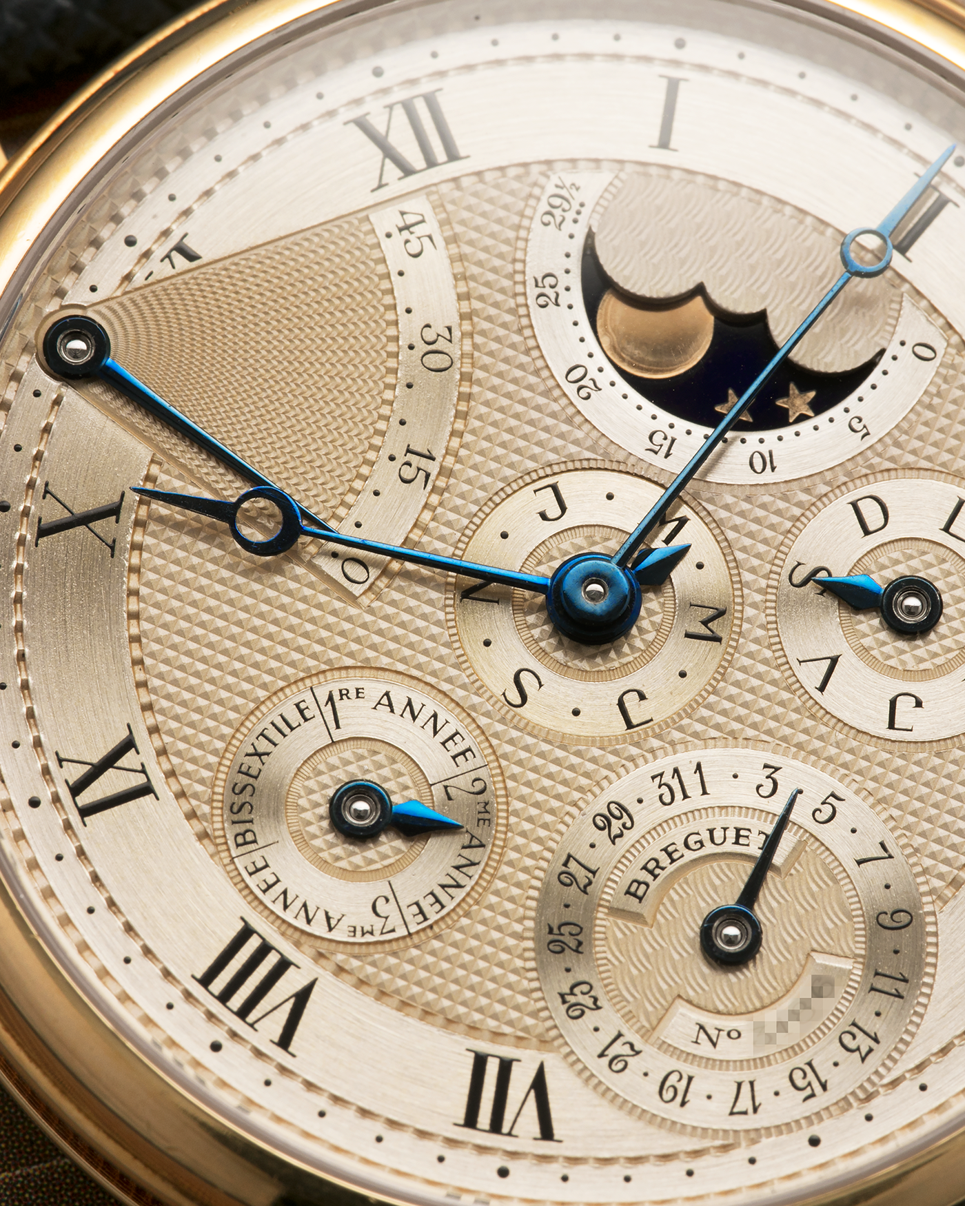 Brand: Breguet
Year: 1994 C Series
Model: Classique Quantième Perpétuel
Reference: 3310BA
Material: 18-carat Yellow Gold
Movement: Breguet Cal. 502 DRP, Self-Winding (based on the Frédéric Piguet Cal. 71)
Case Dimensions: 36mm x 8mm (Lug-to-Lug mm 43.5mm)
Lug Width: 18 mm
Strap: Molequin Dark Navy Textured Calf Leather Strap with Signed 18-carat Yellow Gold Tang Buckle