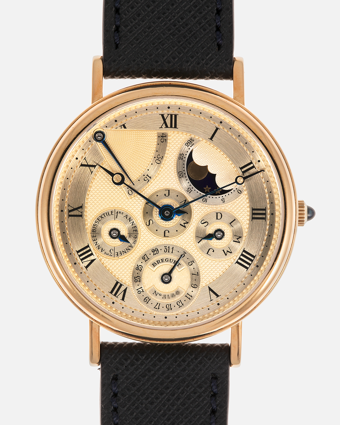Brand: Breguet
Year: 1994 C Series
Model: Classique Quantième Perpétuel
Reference: 3310BA
Material: 18-carat Yellow Gold
Movement: Breguet Cal. 502 DRP, Self-Winding (based on the Frédéric Piguet Cal. 71)
Case Dimensions: 36mm x 8mm (Lug-to-Lug mm 43.5mm)
Lug Width: 18 mm
Strap: Molequin Dark Navy Textured Calf Leather Strap with Signed 18-carat Yellow Gold Tang Buckle