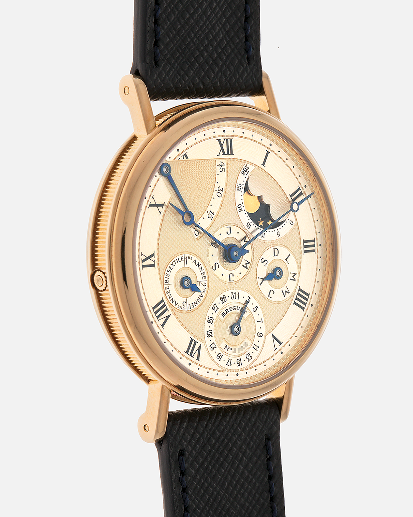 Brand: Breguet
Year: 1994 C Series
Model: Classique Quantième Perpétuel
Reference: 3310BA
Material: 18-carat Yellow Gold
Movement: Breguet Cal. 502 DRP, Self-Winding (based on the Frédéric Piguet Cal. 71)
Case Dimensions: 36mm x 8mm (Lug-to-Lug mm 43.5mm)
Lug Width: 18 mm
Strap: Molequin Dark Navy Textured Calf Leather Strap with Signed 18-carat Yellow Gold Tang Buckle