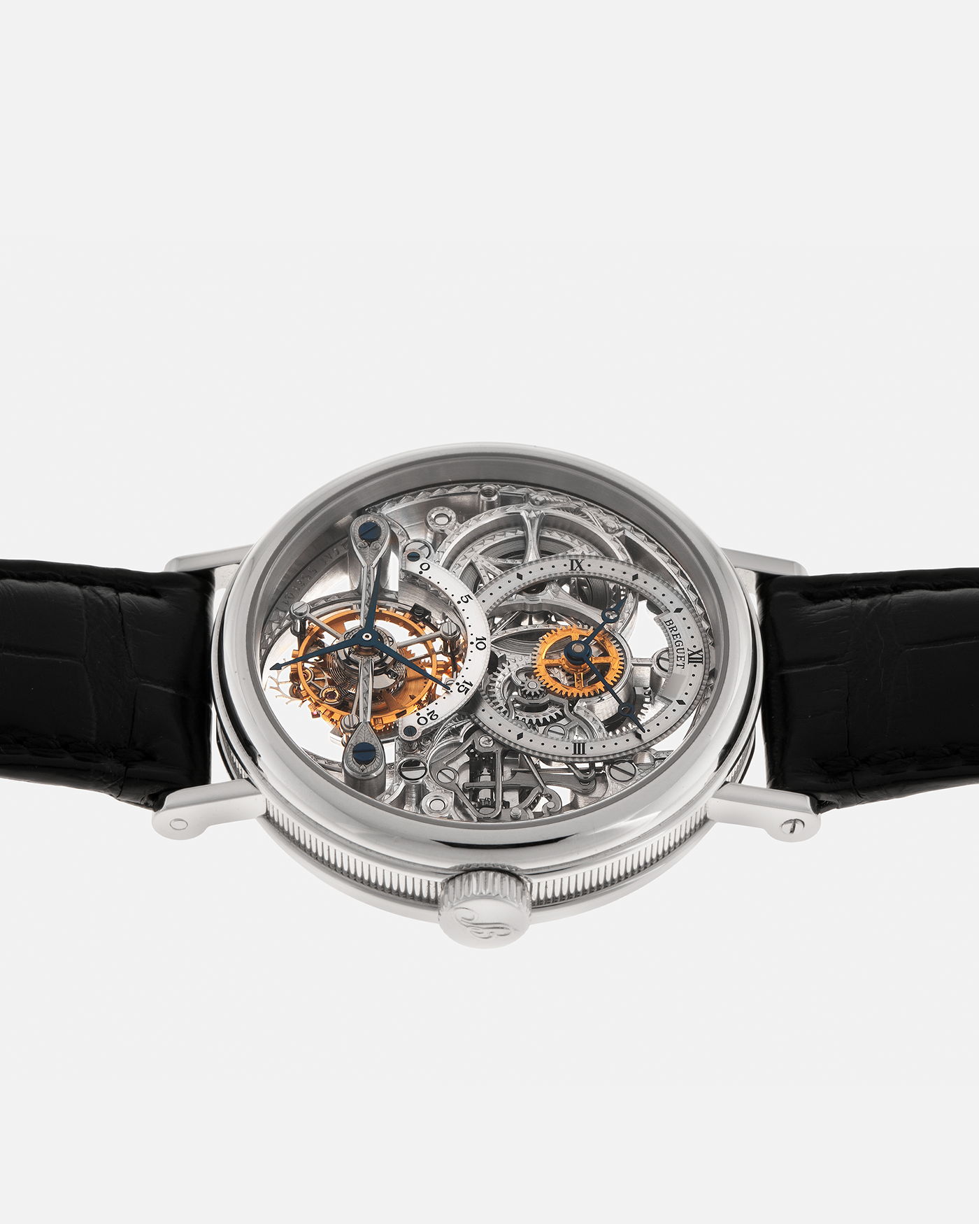 Brand: Breguet
Year: 2000s
Model: Classique Tourbillon ‘Squelette’
Reference Number: 3355PT/00/986
Case Material: Platinum 950
Movement: Breguet Cal. 558 SQ1, Manual-Winding
Case Dimensions: 36mm x 9mm (Lug-to-Lug 43mm)
Lug Width: 18mm
Strap: Breguet Black Alligator Leather Strap with Signed Platinum 950 Deployant Clasp