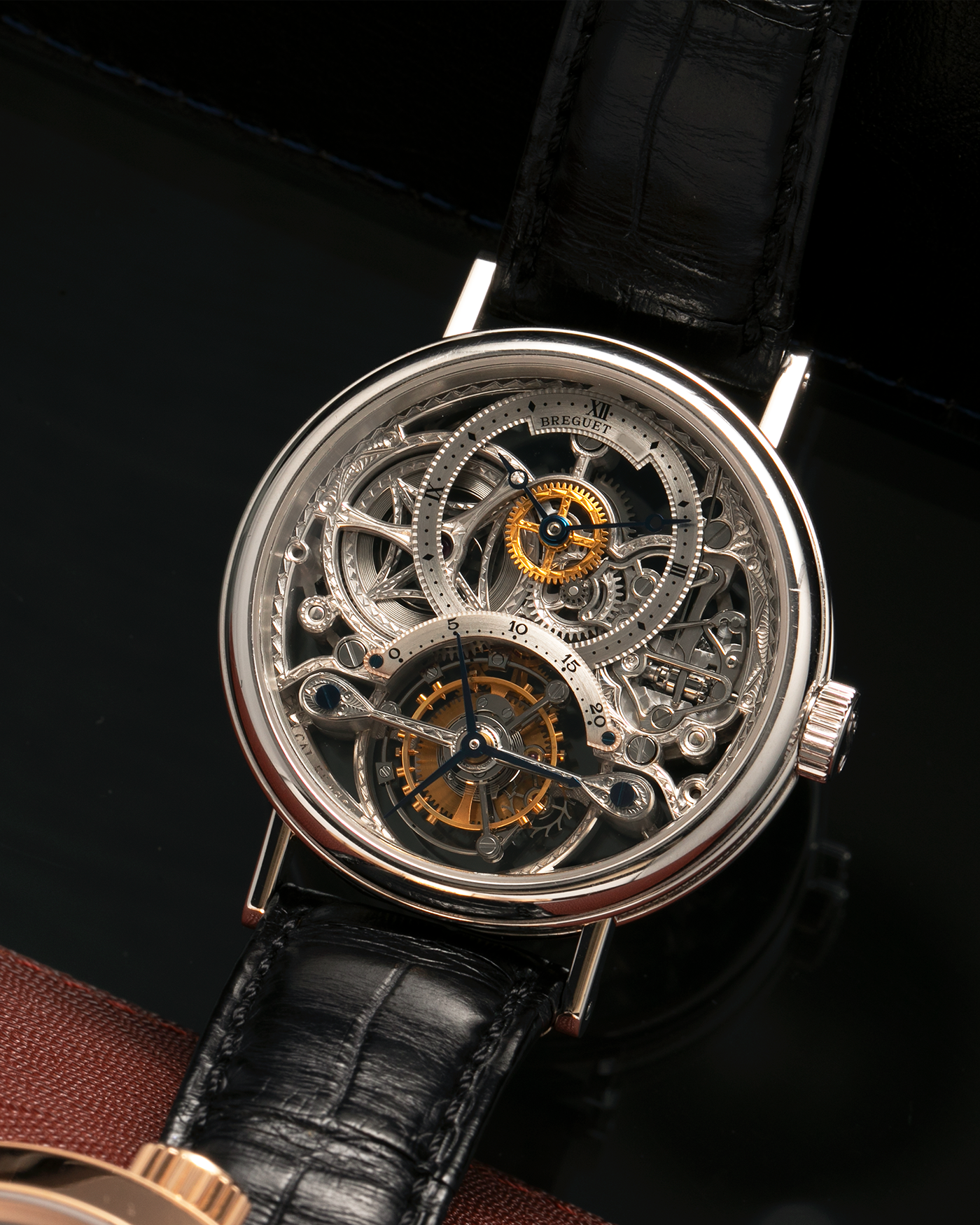 Brand: Breguet
Year: 2000s
Model: Classique Tourbillon ‘Squelette’
Reference Number: 3355PT/00/986
Case Material: Platinum 950
Movement: Breguet Cal. 558 SQ1, Manual-Winding
Case Dimensions: 36mm x 9mm (Lug-to-Lug 43mm)
Lug Width: 18mm
Strap: Breguet Black Alligator Leather Strap with Signed Platinum 950 Deployant Clasp