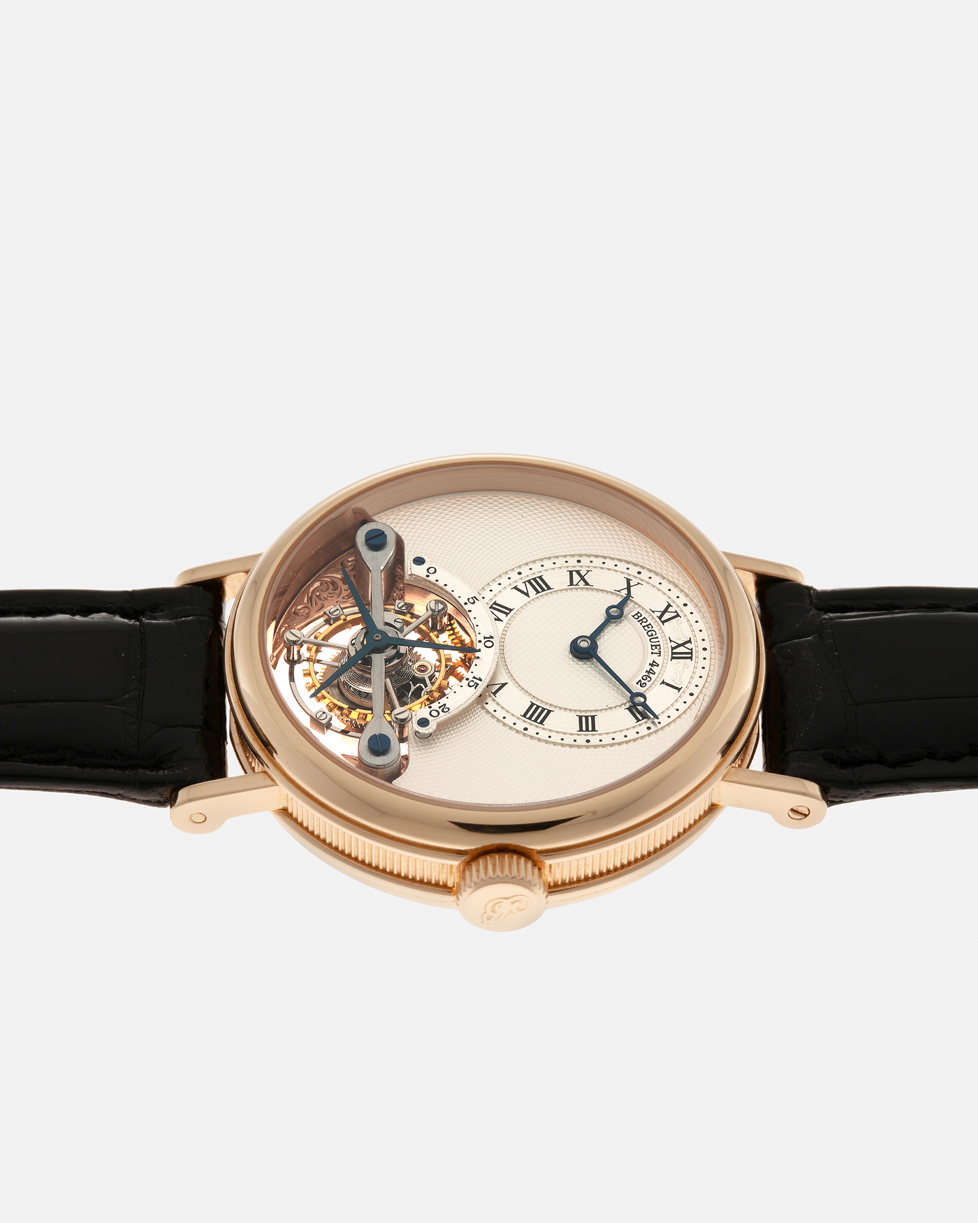 Brand: Breguet
Year: 2017
Model: Classique Tourbillon
Reference: 3357BR/12/986
Material: 18-carat Rose Gold
Movement: Breguet Cal. 558.1, Manual-Winding
Case Dimensions: 36mm x 9.5mm (Lug-to-Lug 43mm)
Lug Width: 18mm
Strap: Breguet Black Alligator Leather Strap with Signed 18-carat Rose Gold Deployant Clasp