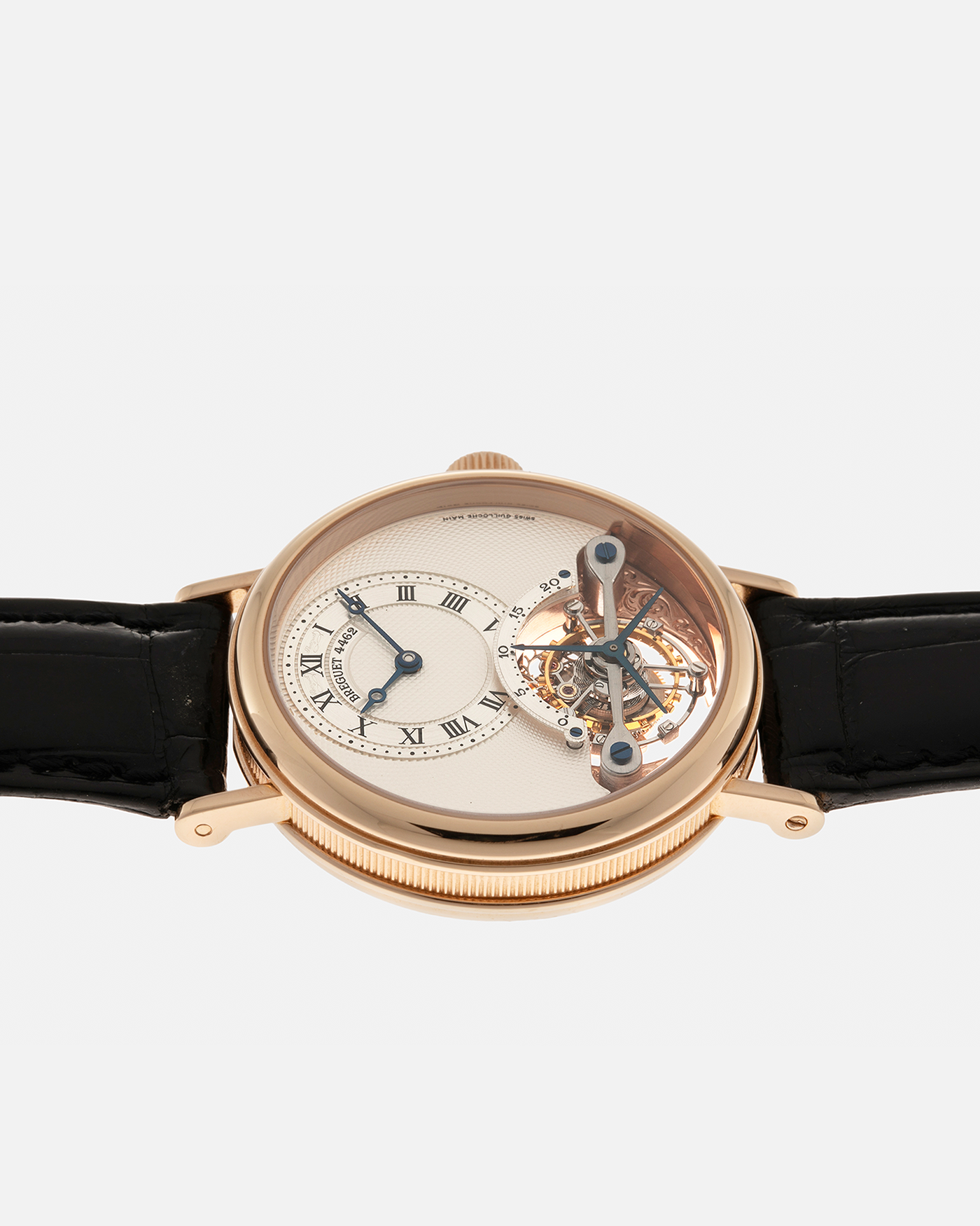 Brand: Breguet
Year: 2017
Model: Classique Tourbillon
Reference: 3357BR/12/986
Material: 18-carat Rose Gold
Movement: Breguet Cal. 558.1, Manual-Winding
Case Dimensions: 36mm x 9.5mm (Lug-to-Lug 43mm)
Lug Width: 18mm
Strap: Breguet Black Alligator Leather Strap with Signed 18-carat Rose Gold Deployant Clasp