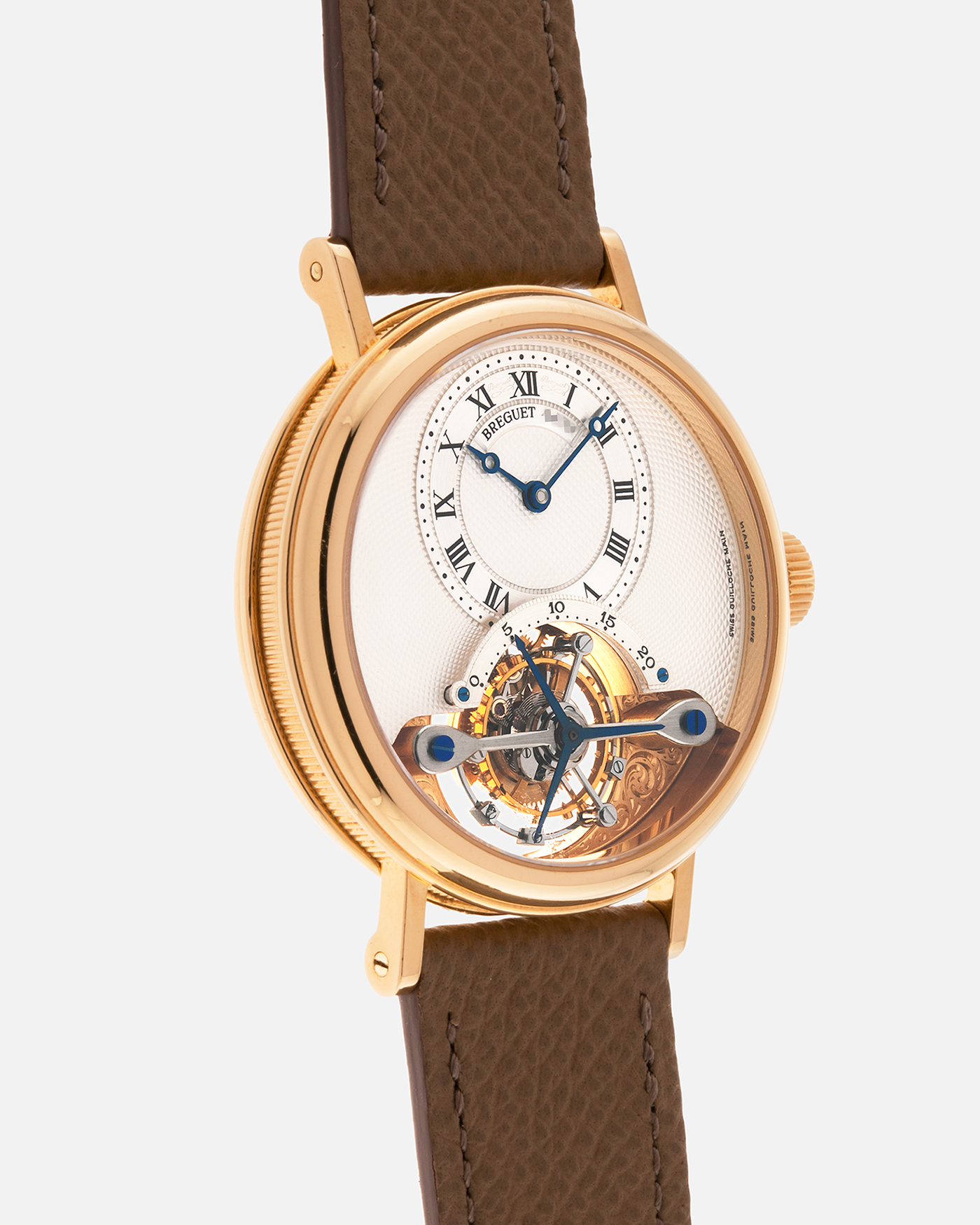 Brand: Breguet
Year: 2000-2001, K Series
Model: Classique Tourbillon
Reference: 3357BA
Material: 18-carat Yellow Gold
Movement: Breguet Cal. 558, Manually Wound One Minute Tourbillon
Case Dimensions: 35mm Diameter 9mm Thickness
Lug Width: 18 mm
Strap: Nostime Taupe Textured Calf Strap and 18k Yellow Gold Breguet Deployant