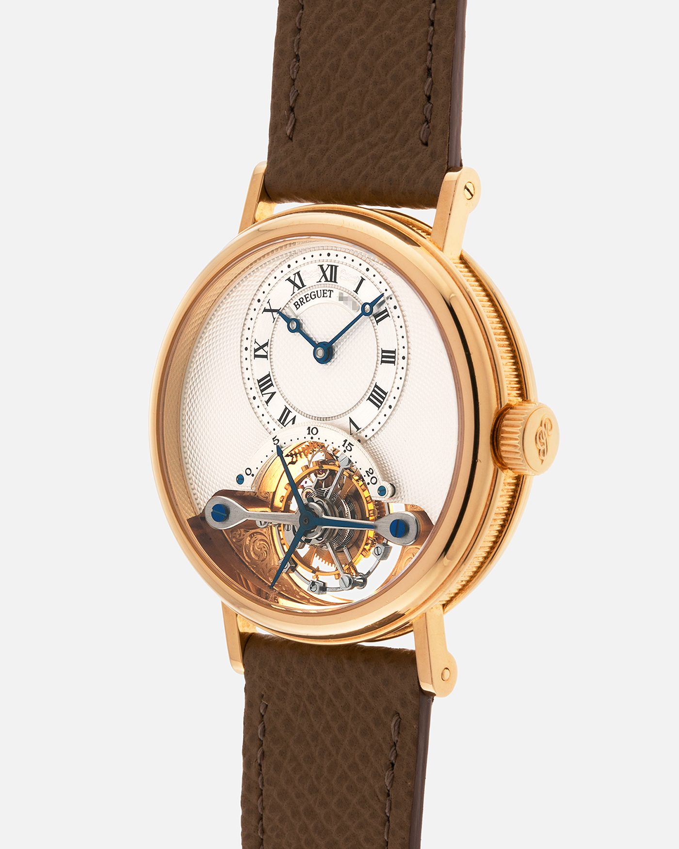 Brand: Breguet
Year: 2000-2001, K Series
Model: Classique Tourbillon
Reference: 3357BA
Material: 18-carat Yellow Gold
Movement: Breguet Cal. 558, Manually Wound One Minute Tourbillon
Case Dimensions: 35mm Diameter 9mm Thickness
Lug Width: 18 mm
Strap: Nostime Taupe Textured Calf Strap and 18k Yellow Gold Breguet Deployant