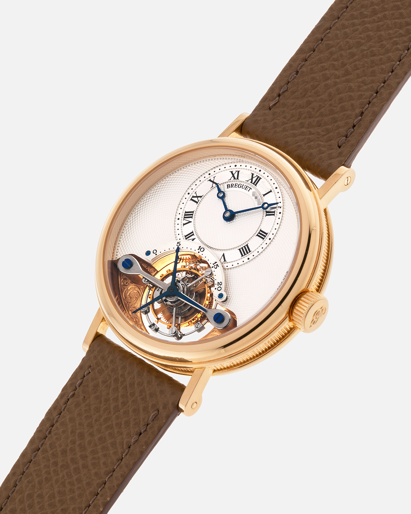 Brand: Breguet
Year: 2000-2001, K Series
Model: Classique Tourbillon
Reference: 3357BA
Material: 18-carat Yellow Gold
Movement: Breguet Cal. 558, Manually Wound One Minute Tourbillon
Case Dimensions: 35mm Diameter 9mm Thickness
Lug Width: 18 mm
Strap: Nostime Taupe Textured Calf Strap and 18k Yellow Gold Breguet Deployant