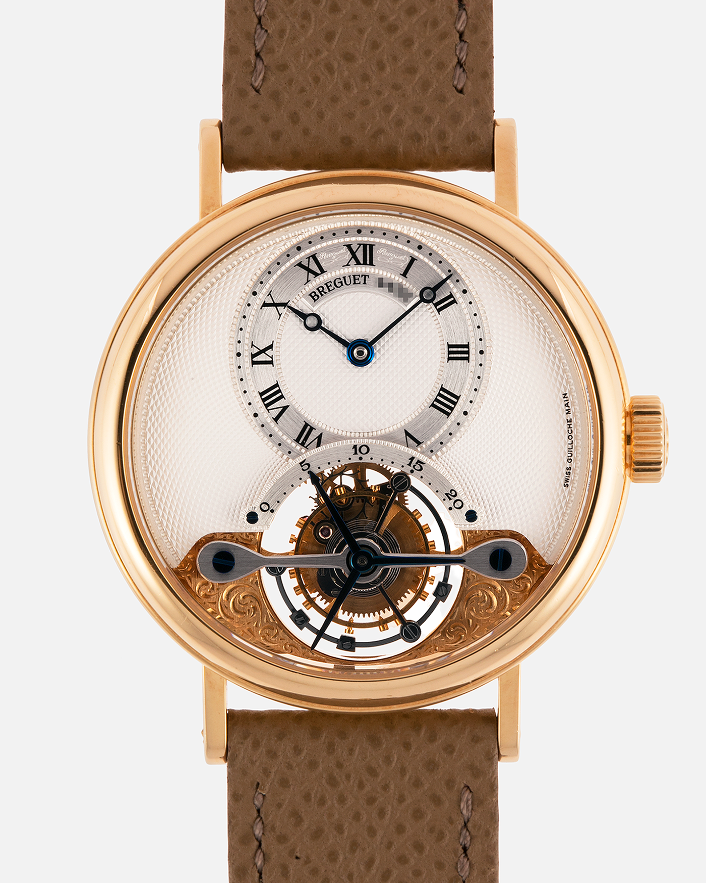 Brand: Breguet
Year: 2000-2001, K Series
Model: Classique Tourbillon
Reference: 3357BA
Material: 18-carat Yellow Gold
Movement: Breguet Cal. 558, Manually Wound One Minute Tourbillon
Case Dimensions: 35mm Diameter 9mm Thickness
Lug Width: 18 mm
Strap: Nostime Taupe Textured Calf Strap and 18k Yellow Gold Breguet Deployant