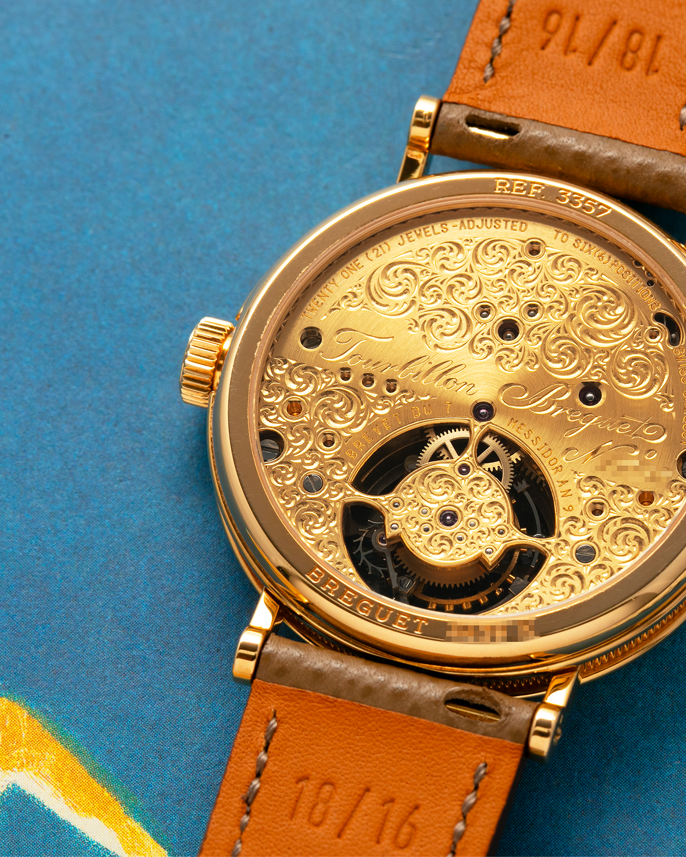 Brand: Breguet
Year: 2000-2001, K Series
Model: Classique Tourbillon
Reference: 3357BA
Material: 18-carat Yellow Gold
Movement: Breguet Cal. 558, Manually Wound One Minute Tourbillon
Case Dimensions: 35mm Diameter 9mm Thickness
Lug Width: 18 mm
Strap: Nostime Taupe Textured Calf Strap and 18k Yellow Gold Breguet Deployant