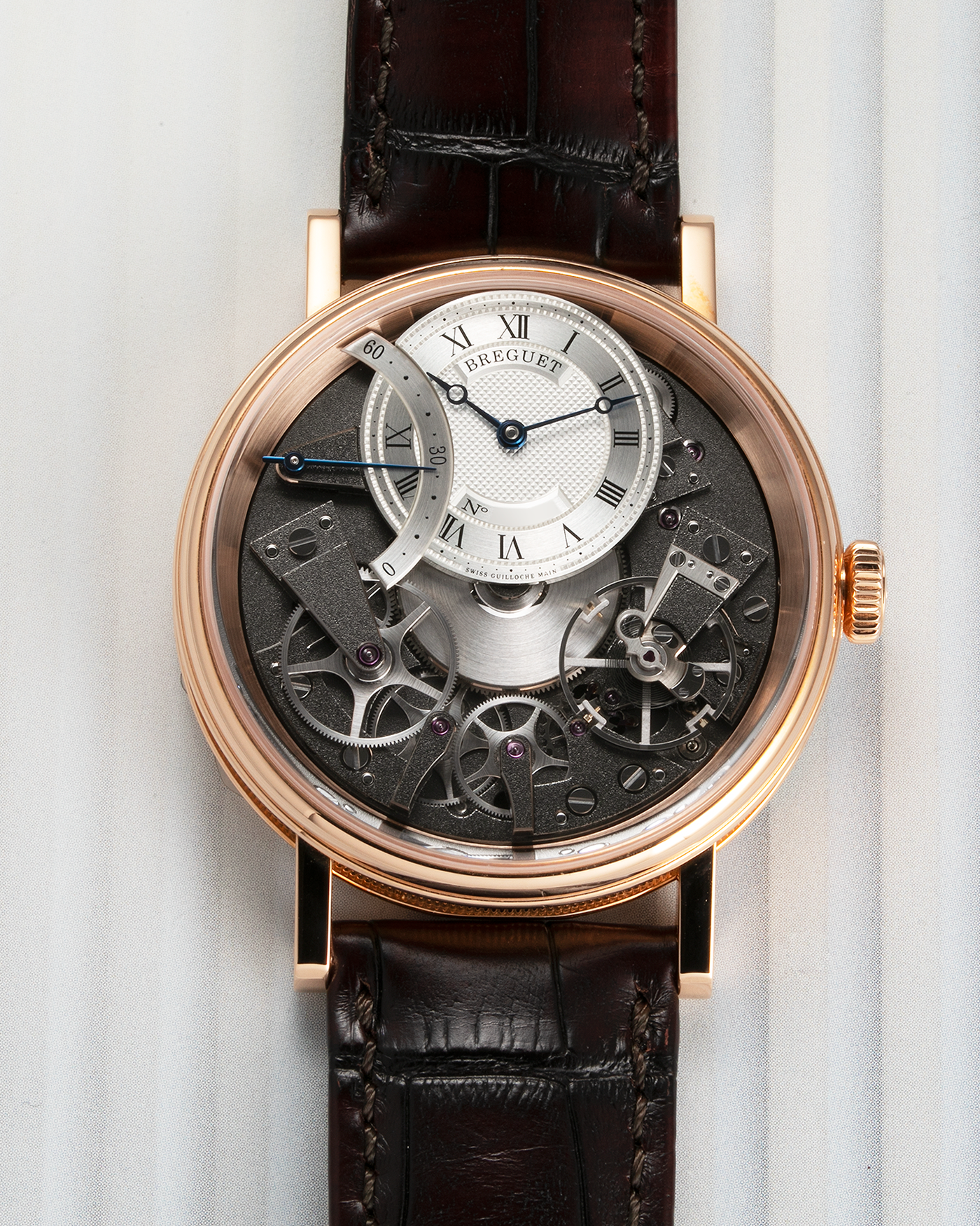 Brand: Breguet Year: 2022 Model: Tradition Automatique Seconde Retrograde Reference: 7097 Material: 18-carat Rose Gold Movement: Breguet Cal. 505 SR1, Self-Winding Case Diameter: 40mm Strap: Breguet Medium Brown Alligator Strap with signed 18-carat Rose Gold Tang Buckle
