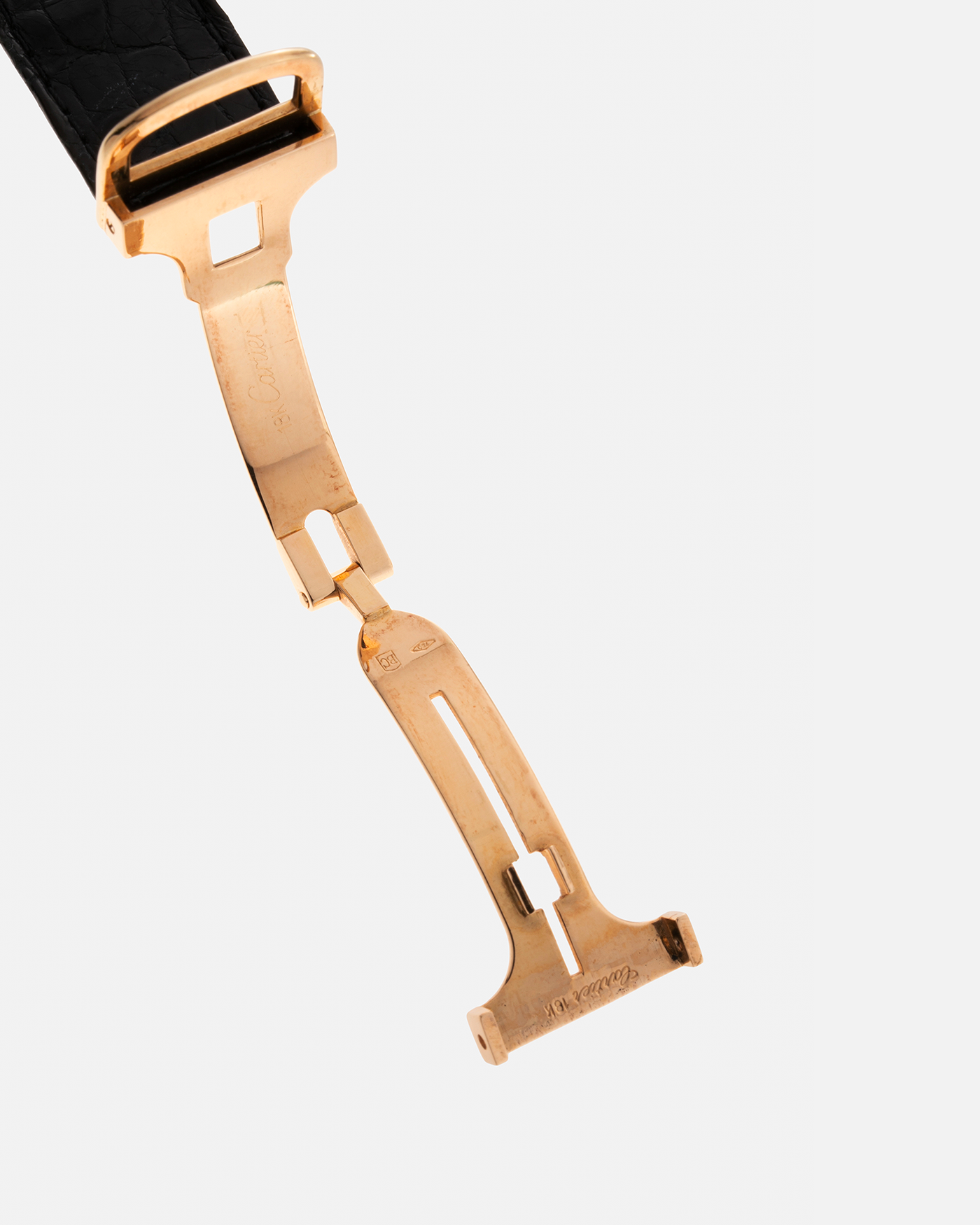 Brand: Cartier Year: 1970s Model: Ceinture ‘Jumbo’ Reference Number: AS03953 Material: 18-carat Yellow Gold Movement: Cartier Cal. 78.1. Manual-Winding Case Diameter: 31mm x 33mm Strap: Cartier Black Textured Leather Strap with Signed 18-carat Yellow Gold