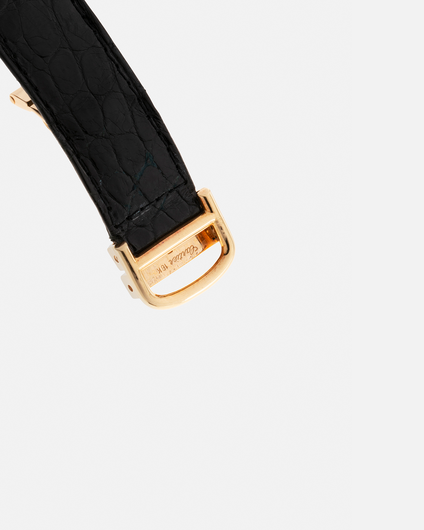 Brand: Cartier Year: 1970s Model: Ceinture ‘Jumbo’ Reference Number: AS03953 Material: 18-carat Yellow Gold Movement: Cartier Cal. 78.1. Manual-Winding Case Diameter: 31mm x 33mm Strap: Cartier Black Textured Leather Strap with Signed 18-carat Yellow Gold