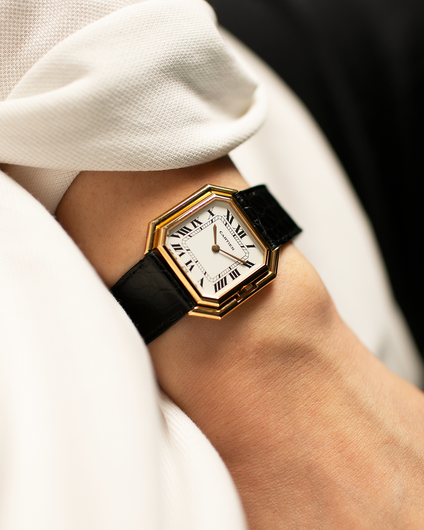 Brand: Cartier Year: 1970s Model: Ceinture ‘Jumbo’ Reference Number: AS03953 Material: 18-carat Yellow Gold Movement: Cartier Cal. 78.1. Manual-Winding Case Diameter: 31mm x 33mm Strap: Cartier Black Textured Leather Strap with Signed 18-carat Yellow Gold