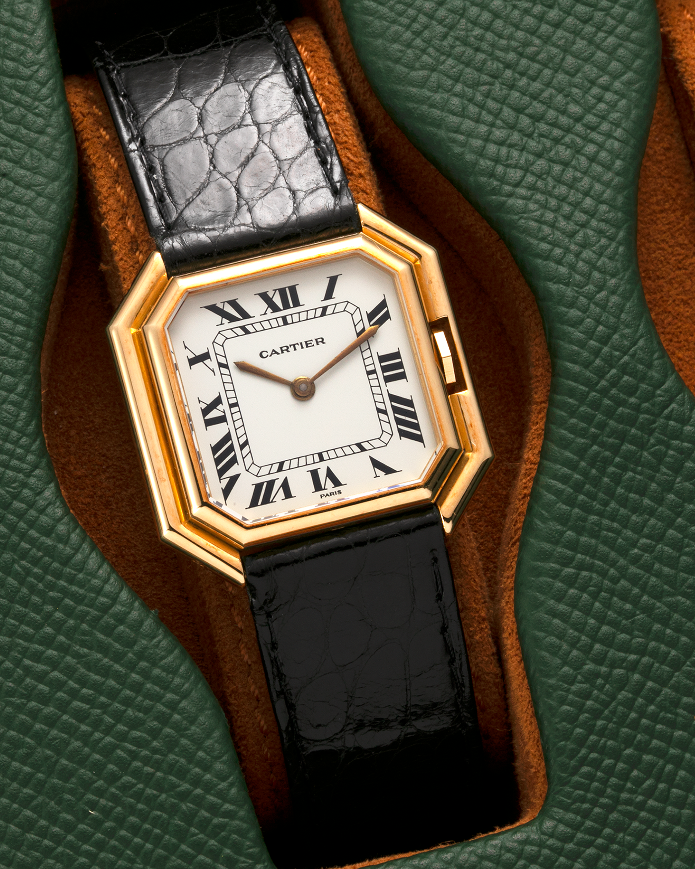 Brand: Cartier Year: 1970s Model: Ceinture ‘Jumbo’ Reference Number: AS03953 Material: 18-carat Yellow Gold Movement: Cartier Cal. 78.1. Manual-Winding Case Diameter: 31mm x 33mm Strap: Cartier Black Textured Leather Strap with Signed 18-carat Yellow Gold
