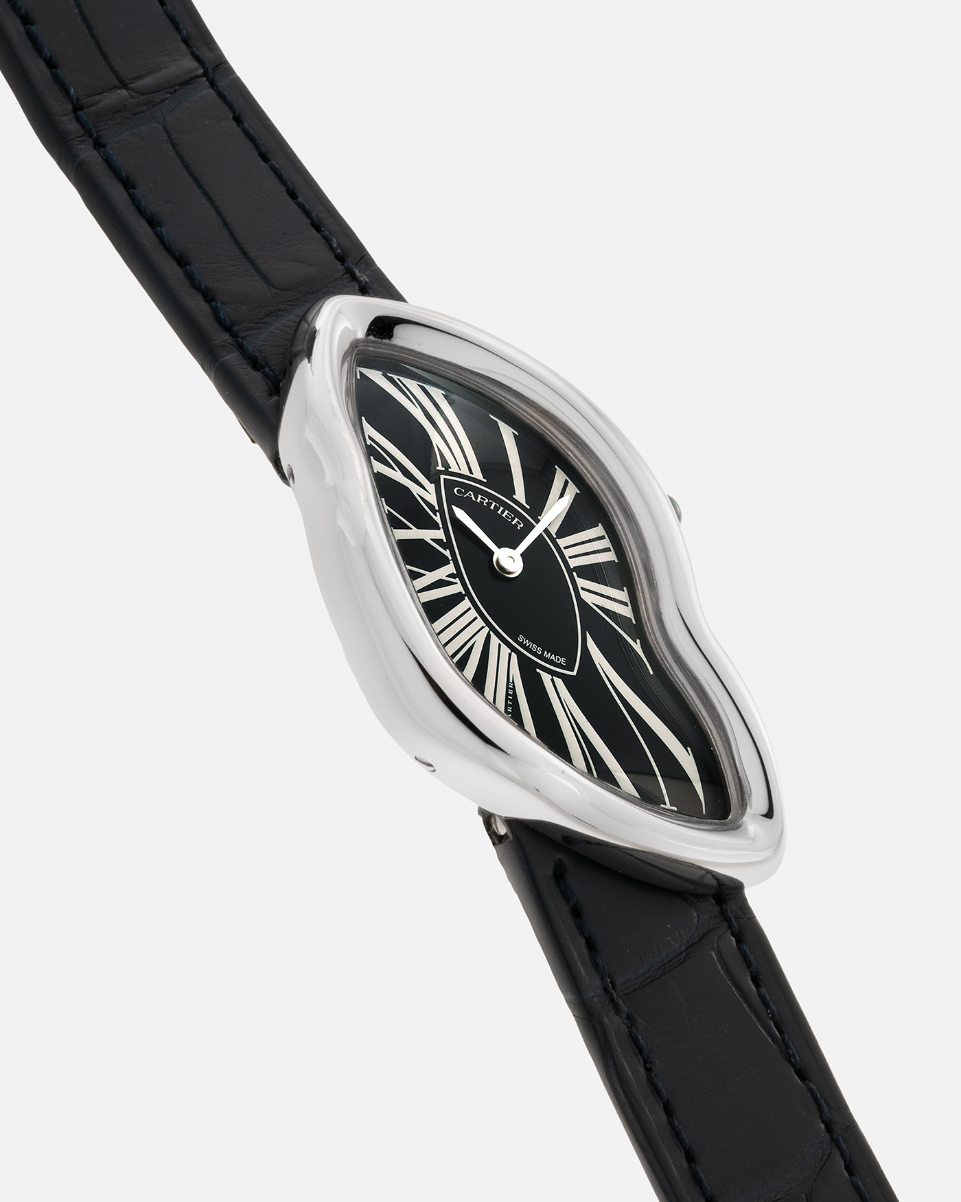 Brand: Cartier Year: 2023 Model: Crash Reference Number: WGCH0080, New Special Order Material: 18-carat White Gold (Rhodium Plated) Movement: Cartier Cal. 1917 MC, Manual-Winding Case Dimensions: 42mm x 24mm (Asymmetrical Case) Strap: Cartier Black Alligator Strap with Signed 18-carat White Gold ‘Crash’ Deployant Buckle