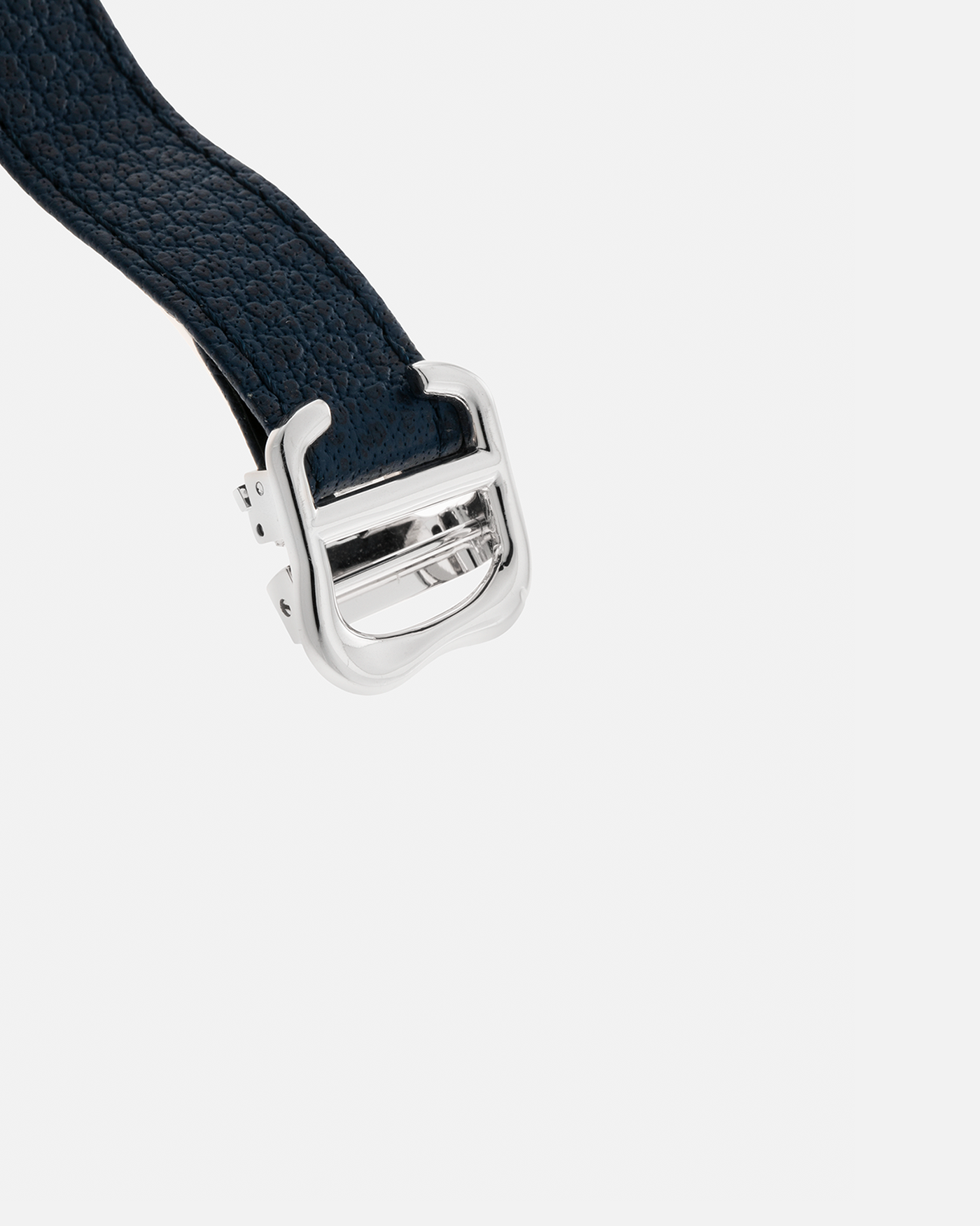 Brand: Cartier Year: 2022 Model: Crash Reference Number: WGCH0080, New Special Order Material: 18-carat White Gold (Rhodium Plated) Movement: Cartier Cal. 1917 MC, Manual-Winding Case Dimensions: 42mm x 24mm (Asymmetrical Case) Strap: Cartier Navy Blue Alligator Strap with Signed 18-carat White Gold ‘Crash’ Deployant Buckle