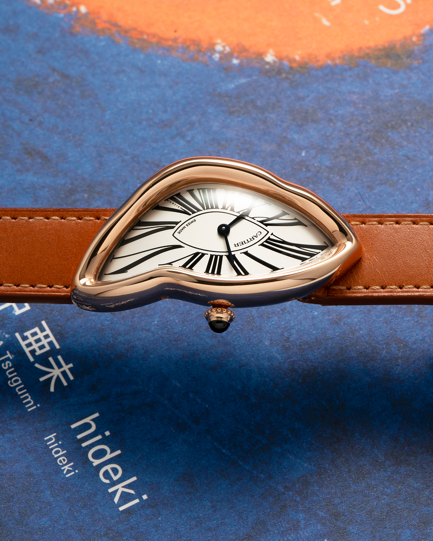 Brand: Cartier Year: 2022 Model: Crash Reference Number: WGCH0031, New Special Order Material: 18-carat Rose Gold Movement: Cartier Cal. 1917 MC, Manual-Winding Case Diameter: 42mm x 24mm (Asymmetrical Case) Strap: Cartier Tanned Brown Leather with Signed 18-carat Rose Gold ‘Crash’ Deployant Clasp