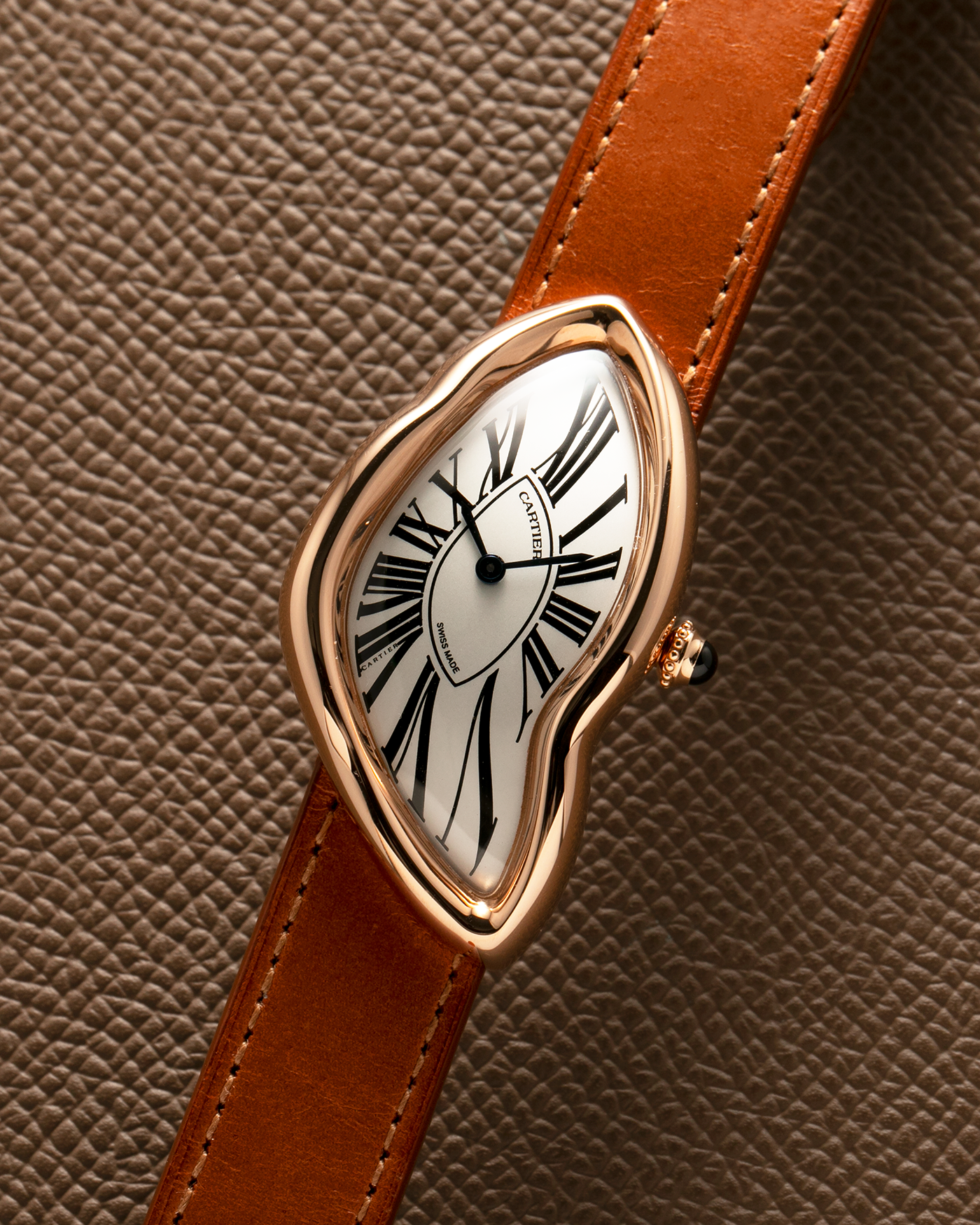 Brand: Cartier Year: 2022 Model: Crash Reference Number: WGCH0031, New Special Order Material: 18-carat Rose Gold Movement: Cartier Cal. 1917 MC, Manual-Winding Case Diameter: 42mm x 24mm (Asymmetrical Case) Strap: Cartier Tanned Brown Leather with Signed 18-carat Rose Gold ‘Crash’ Deployant Clasp