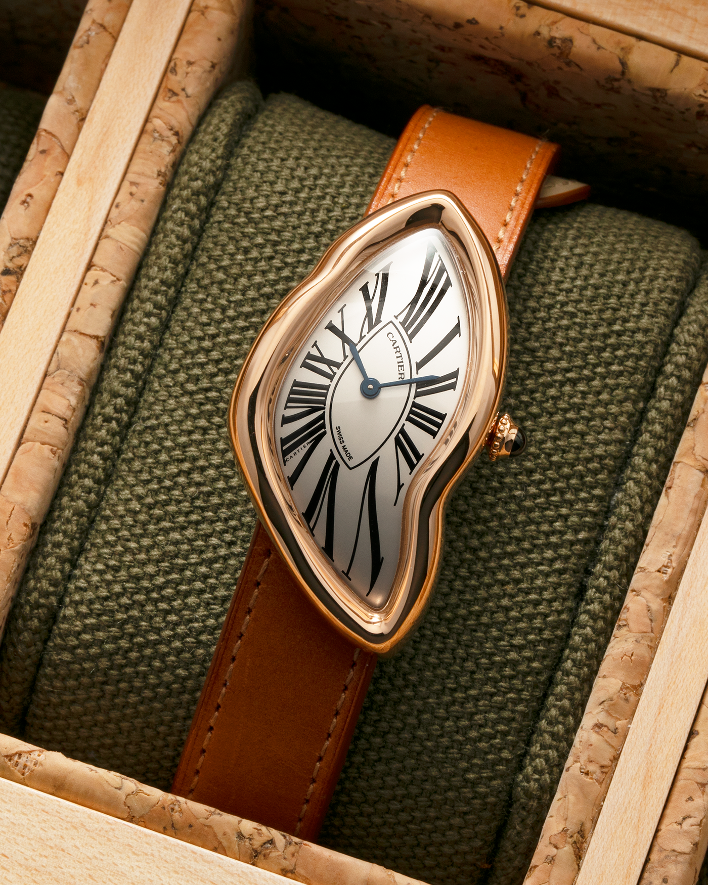 Brand: Cartier Year: 2022 Model: Crash Reference Number: WGCH0031, New Special Order Material: 18-carat Rose Gold Movement: Cartier Cal. 1917 MC, Manual-Winding Case Diameter: 42mm x 24mm (Asymmetrical Case) Strap: Cartier Tanned Brown Leather with Signed 18-carat Rose Gold ‘Crash’ Deployant Clasp