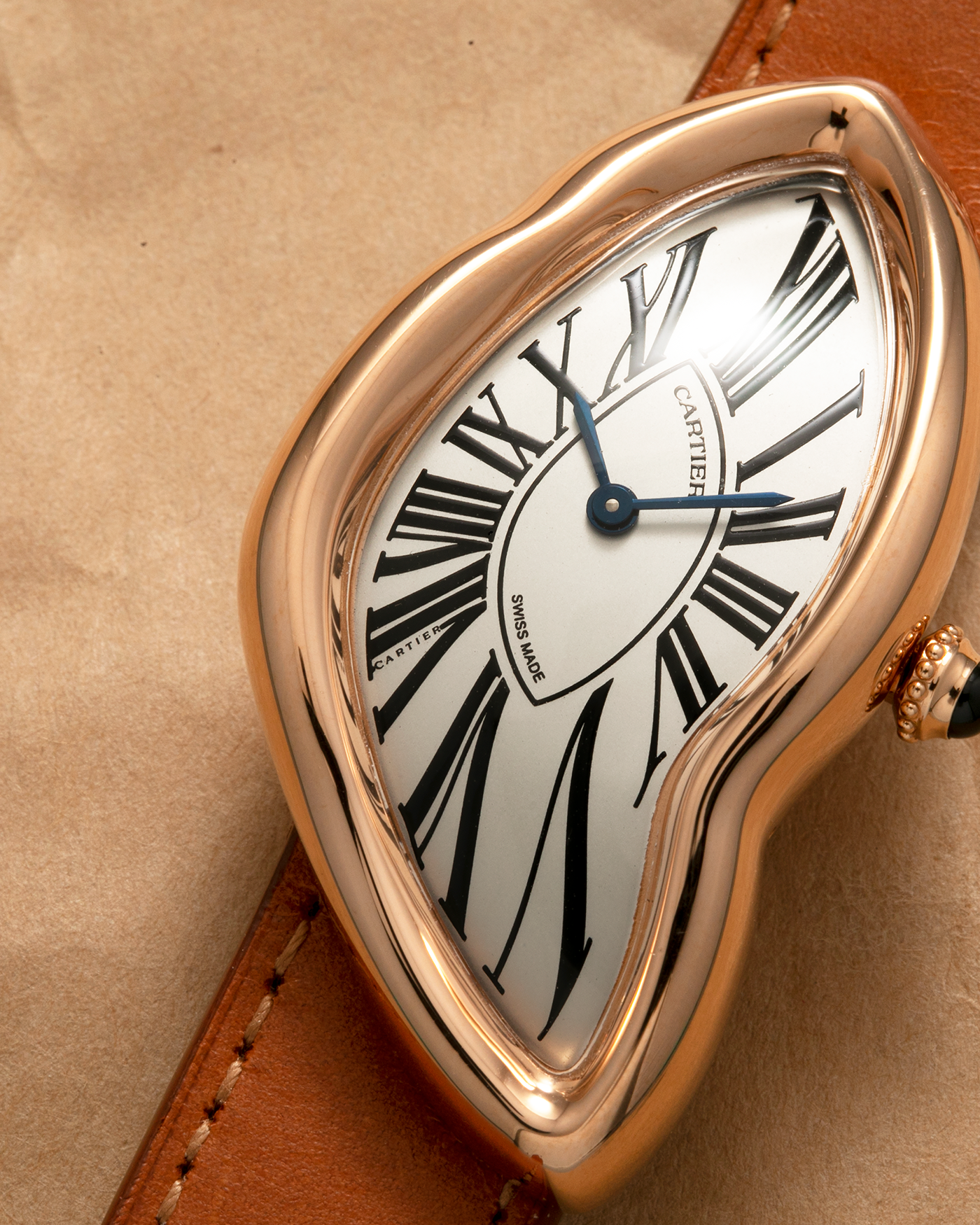 Brand: Cartier Year: 2022 Model: Crash Reference Number: WGCH0031, New Special Order Material: 18-carat Rose Gold Movement: Cartier Cal. 1917 MC, Manual-Winding Case Diameter: 42mm x 24mm (Asymmetrical Case) Strap: Cartier Tanned Brown Leather with Signed 18-carat Rose Gold ‘Crash’ Deployant Clasp
