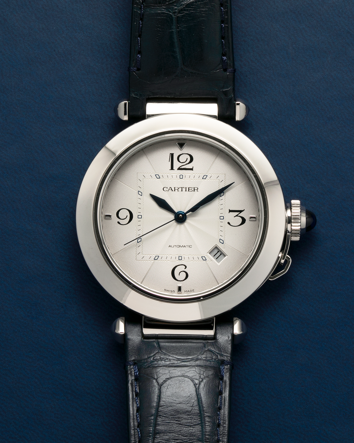 Brand: Cartier
Year: 2021
Model: Pasha 41
Reference Number: 4266, WSPA0010
Material: Stainless Steel
Movement: Cartier Cal. 1847, Self-Winding
Case Dimensions: 41mm x 9.55mm (Lug-to-Lug 47.5mm)
Lug Width: 20mm
Straps: Cartier Dark Blue Alligator Leather Strap with Signed Stainless Steel Deployant Clasp, extra Cartier Dark Grey Alligator Leather Strap
