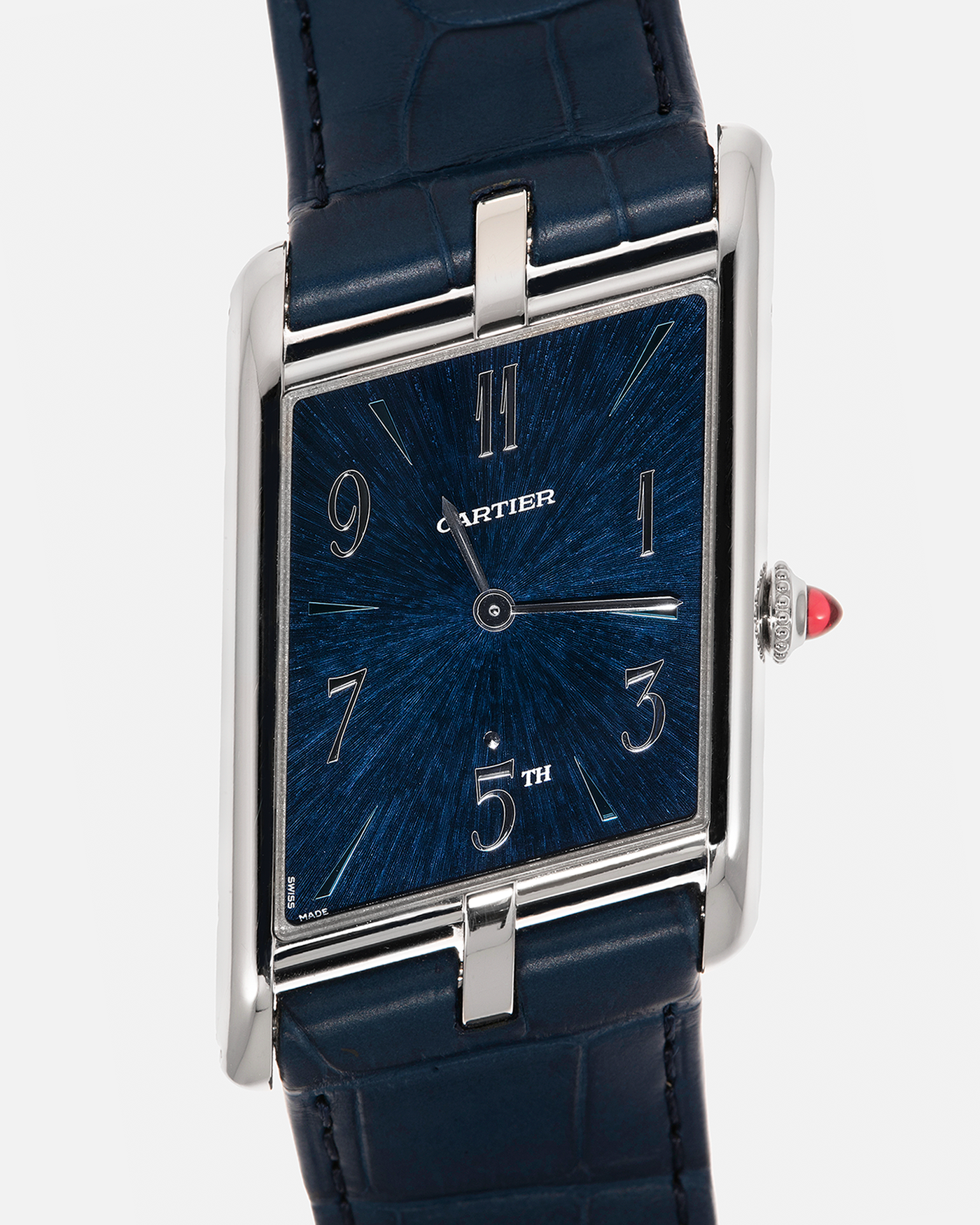 Brand: Cartier
Year: 2024
Model: Privé Tank Asymétrique 5th Ave New York Edition
Reference: WGTA0120
Material:  Platinum 950
Movement: Cartier Cal. 1917MC, Manual-Winding
Case Dimensions: 47mm x 26mm x 6.4mm (44.5mm Lug-to-Lug)
Strap: Cartier Blue Alligator Leather Strap with Signed Platinum 950 Tang Buckle