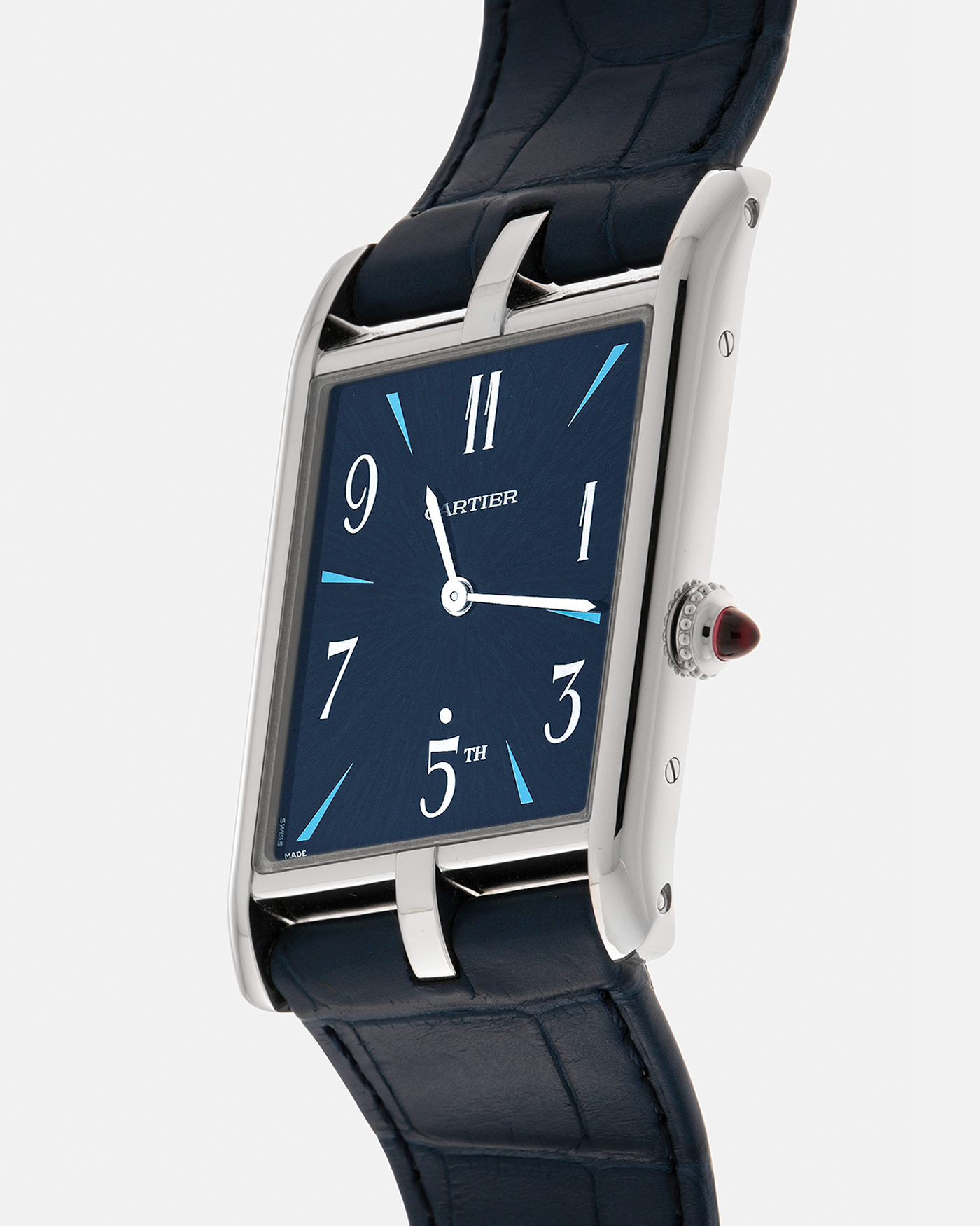 Brand: Cartier
Year: 2024
Model: Privé Tank Asymétrique 5th Ave New York Edition
Reference: WGTA0120
Material:  Platinum 950
Movement: Cartier Cal. 1917MC, Manual-Winding
Case Dimensions: 47mm x 26mm x 6.4mm (44.5mm Lug-to-Lug)
Strap: Cartier Blue Alligator Leather Strap with Signed Platinum 950 Tang Buckle