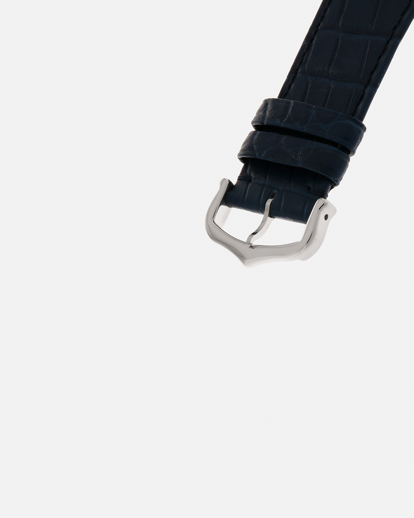 Brand: Cartier
Year: 2024
Model: Privé Tank Asymétrique 5th Ave New York Edition
Reference: WGTA0120
Material:  Platinum 950
Movement: Cartier Cal. 1917MC, Manual-Winding
Case Dimensions: 47mm x 26mm x 6.4mm (44.5mm Lug-to-Lug)
Strap: Cartier Blue Alligator Leather Strap with Signed Platinum 950 Tang Buckle