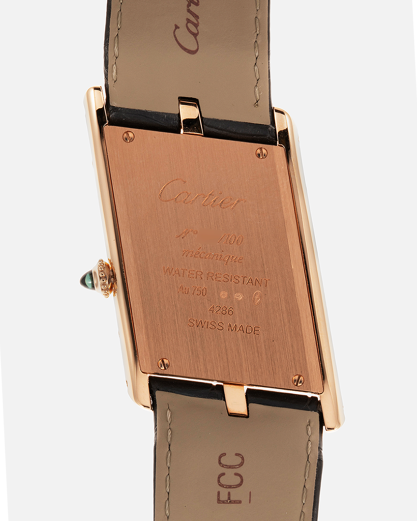 Brand: Cartier Year: 2022 Model: Privé Tank Asymétrique Reference: WGTA0043 Material: 18-carat Red Gold Movement: Cal. 1917MC, Manual-Winding Case Diameter: 47.15mm x 26.2mm x 6.38mm Strap: Cartier Grey Alligator Leather Strap with Signed 18-carat Red Gold Tang Buckle