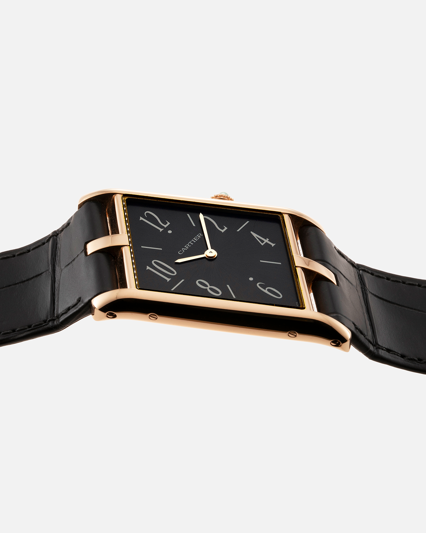 Brand: Cartier Year: 2022 Model: Privé Tank Asymétrique Reference: WGTA0043 Material: 18-carat Red Gold Movement: Cal. 1917MC, Manual-Winding Case Diameter: 47.15mm x 26.2mm x 6.38mm Strap: Cartier Grey Alligator Leather Strap with Signed 18-carat Red Gold Tang Buckle