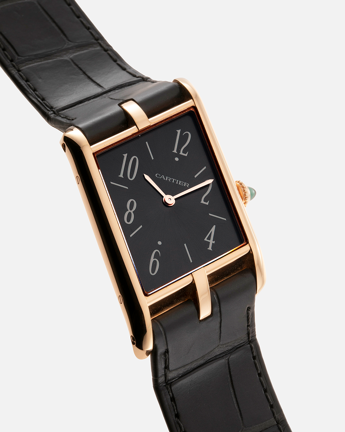 Brand: Cartier Year: 2022 Model: Privé Tank Asymétrique Reference: WGTA0043 Material: 18-carat Red Gold Movement: Cal. 1917MC, Manual-Winding Case Diameter: 47.15mm x 26.2mm x 6.38mm Strap: Cartier Grey Alligator Leather Strap with Signed 18-carat Red Gold Tang Buckle