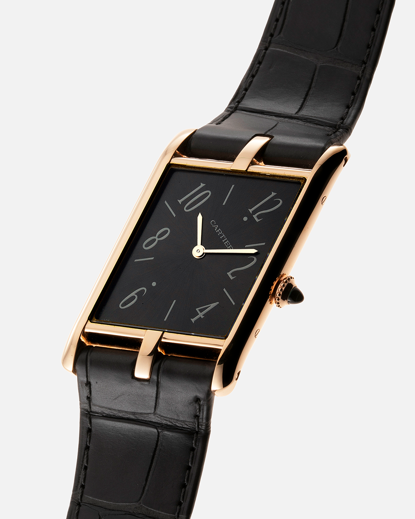 Brand: Cartier Year: 2022 Model: Privé Tank Asymétrique Reference: WGTA0043 Material: 18-carat Red Gold Movement: Cal. 1917MC, Manual-Winding Case Diameter: 47.15mm x 26.2mm x 6.38mm Strap: Cartier Grey Alligator Leather Strap with Signed 18-carat Red Gold Tang Buckle