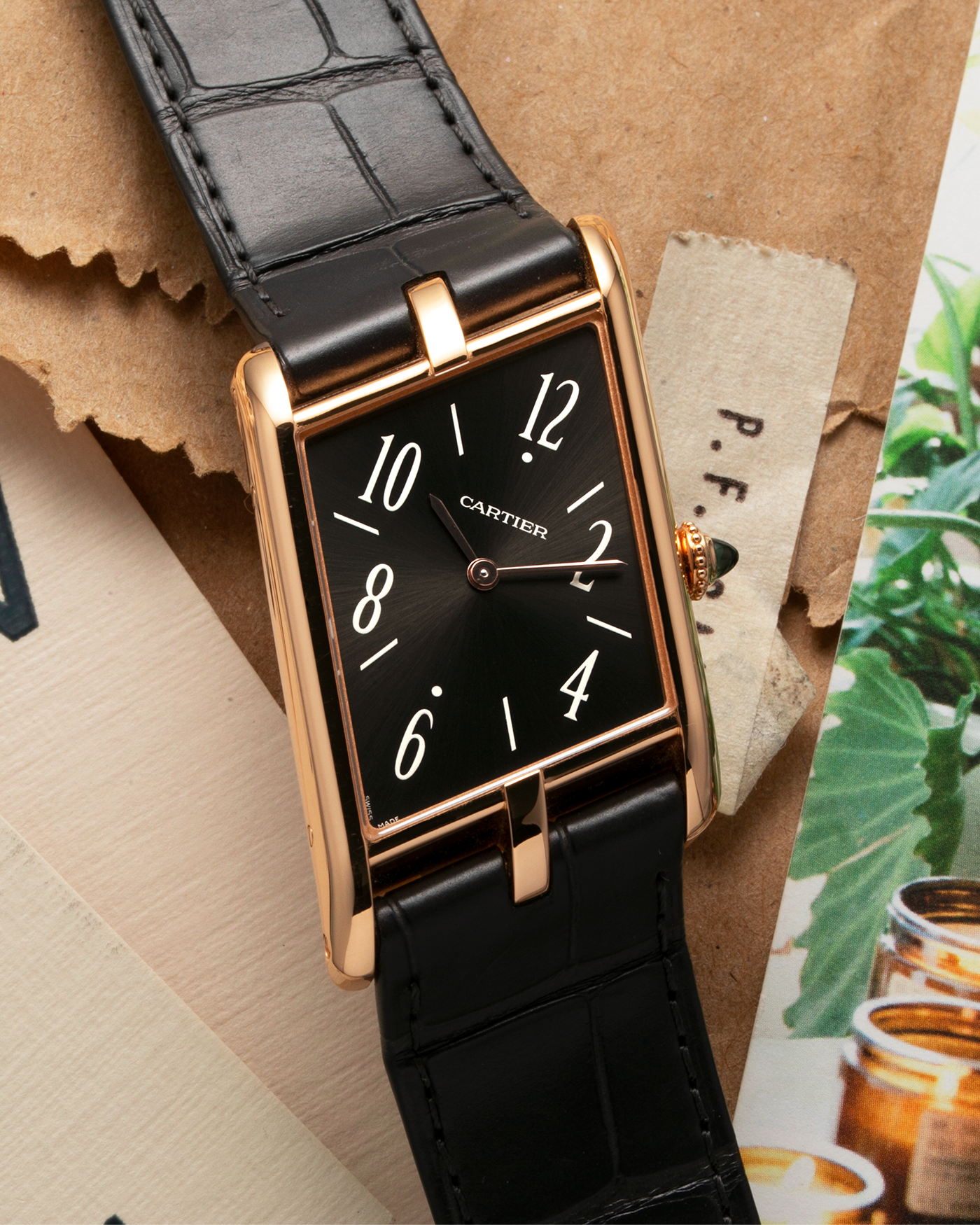 Brand: Cartier Year: 2022 Model: Privé Tank Asymétrique Reference: WGTA0043 Material: 18-carat Red Gold Movement: Cal. 1917MC, Manual-Winding Case Diameter: 47.15mm x 26.2mm x 6.38mm Strap: Cartier Grey Alligator Leather Strap with Signed 18-carat Red Gold Tang Buckle