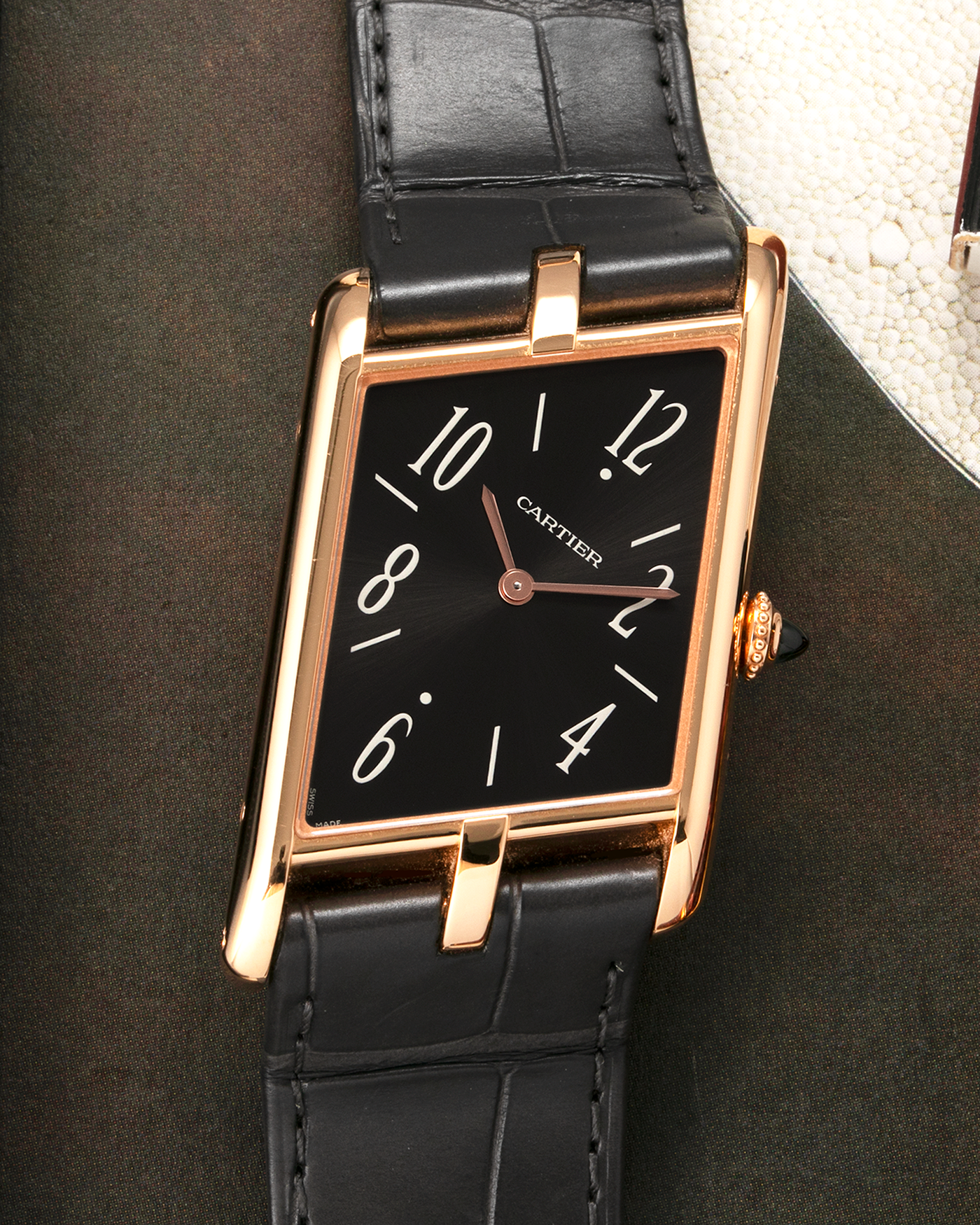 Brand: Cartier Year: 2022 Model: Privé Tank Asymétrique Reference: WGTA0043 Material: 18-carat Red Gold Movement: Cal. 1917MC, Manual-Winding Case Diameter: 47.15mm x 26.2mm x 6.38mm Strap: Cartier Grey Alligator Leather Strap with Signed 18-carat Red Gold Tang Buckle