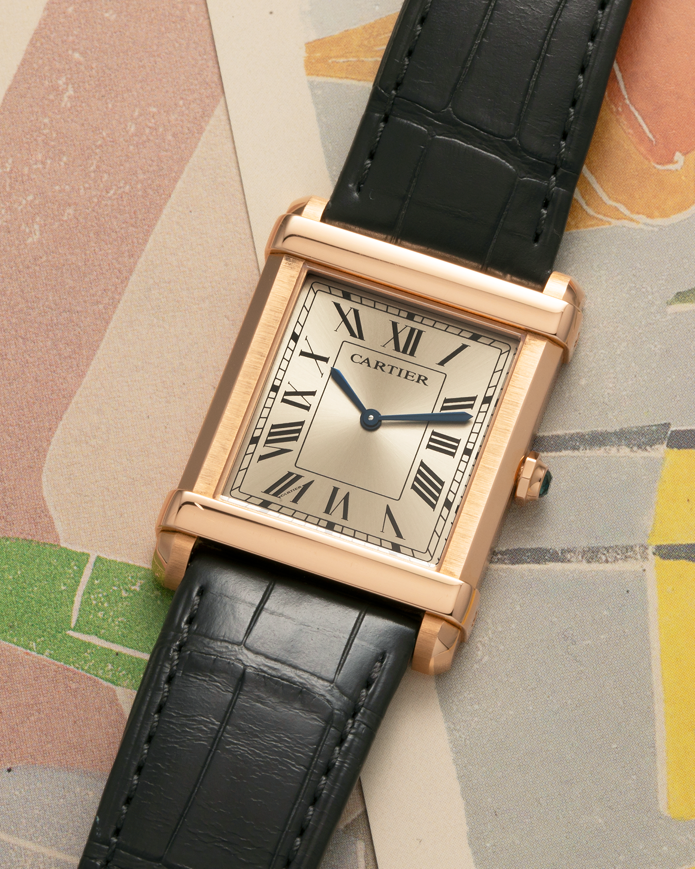 Brand: Cartier
Year: 2022
Model: Privé Tank Chinoise, Limited Edition of 150 Pieces in this Configuration
Reference Number: WGTA0075
Material: 18-carat Rose Gold
Movement: Cartier Cal. 437 MC (Based ocn Piaget Cal. 430P), Manual-Winding
Case Dimensions: 39.5mm x 29mm x 8mm (40mm Lug-to-Lug)
Lug Width: 21mm
Strap: Cartier Anthracite Grey Alligator Leather Strap with Signed 18-carat Rose Gold Tang Buckle