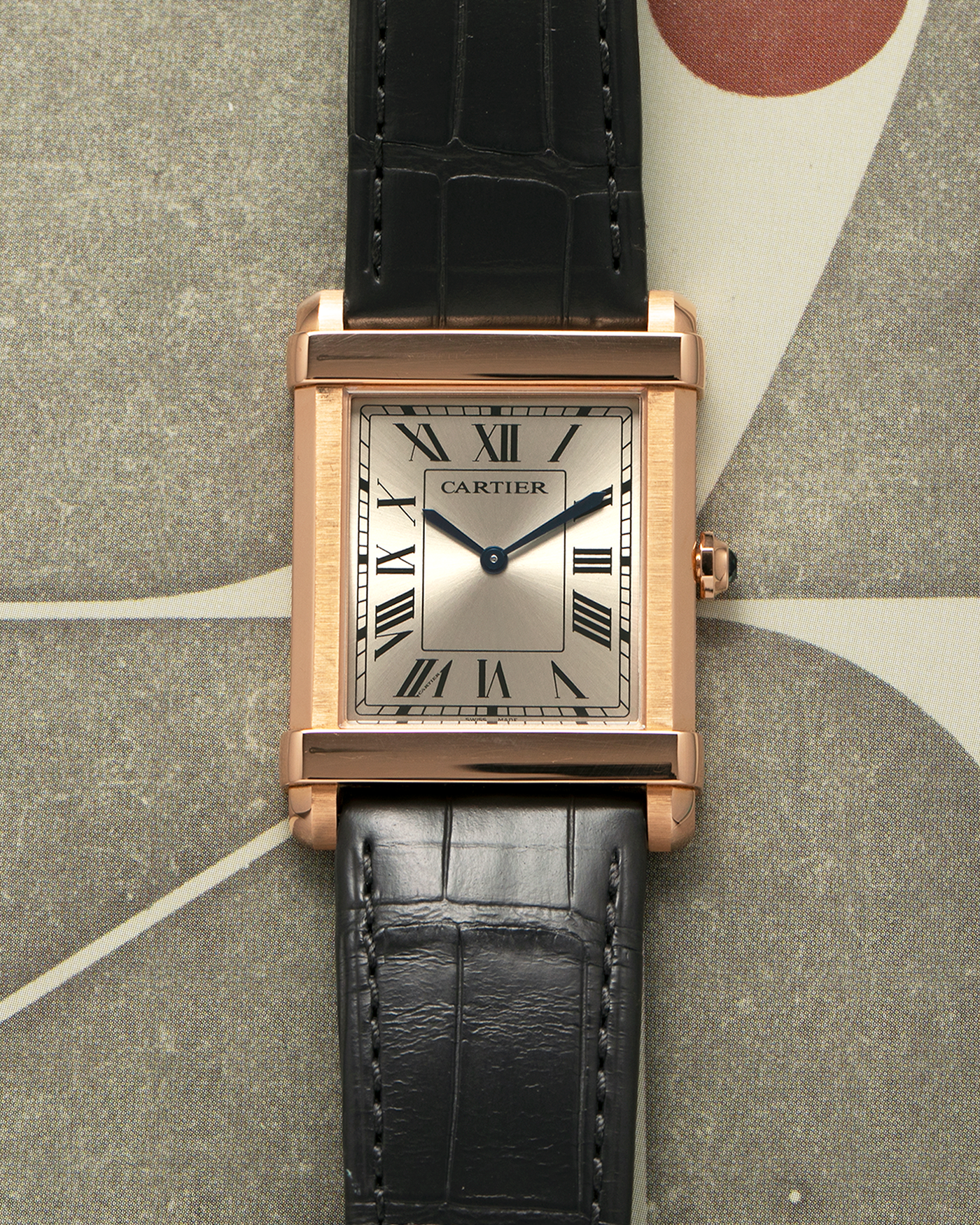 Brand: Cartier
Year: 2022
Model: Privé Tank Chinoise, Limited Edition of 150 Pieces in this Configuration
Reference Number: WGTA0075
Material: 18-carat Rose Gold
Movement: Cartier Cal. 437 MC (Based ocn Piaget Cal. 430P), Manual-Winding
Case Dimensions: 39.5mm x 29mm x 8mm (40mm Lug-to-Lug)
Lug Width: 21mm
Strap: Cartier Anthracite Grey Alligator Leather Strap with Signed 18-carat Rose Gold Tang Buckle