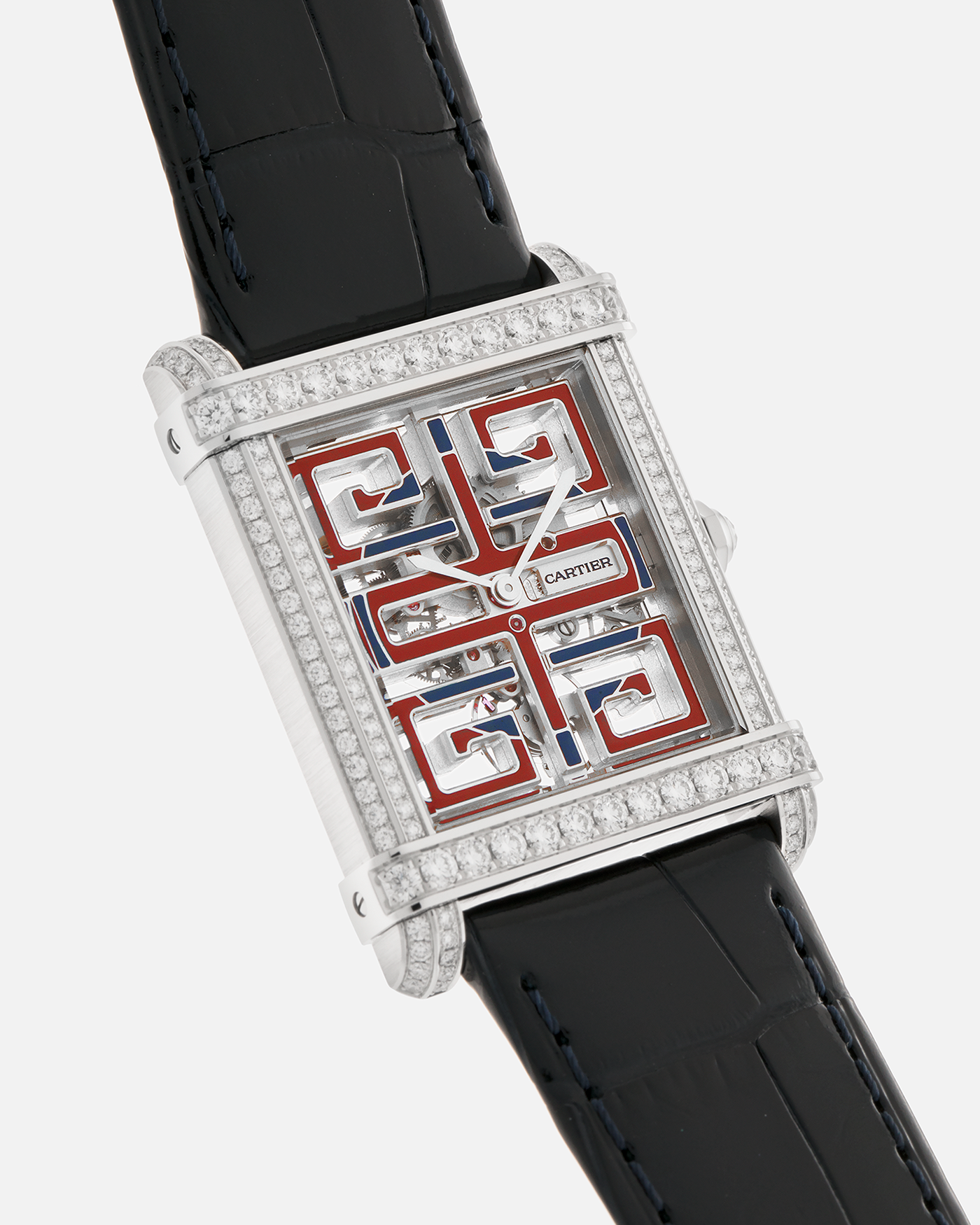 Brand: Cartier
Year: 2022
Model: Privé Tank Chinoise Skeleton, Limited Edition of 20 Pieces in this Configuration
Reference Number: CRHPI01507
Material: Platinum 950 Case, Lacquered Movement Bridges, Diamond-Setting on Case
Movement: Cartier Cal. 9627 MC, Manual-Winding
Case Dimensions: 39.5mm x 29mm x 8mm (Lug-to-Lug 40mm)
Lug Width: 21mm
Strap: Cartier Black Alligator Leather Strap with Signed and Diamond-Set Platinum 950 Tang Buckle
