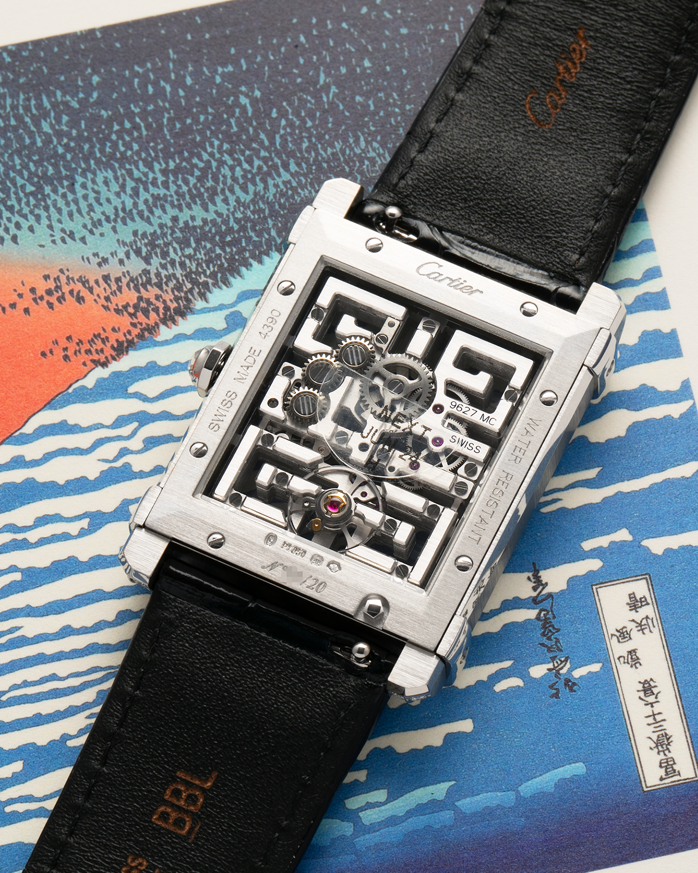 Brand: Cartier
Year: 2022
Model: Privé Tank Chinoise Skeleton, Limited Edition of 20 Pieces in this Configuration
Reference Number: CRHPI01507
Material: Platinum 950 Case, Lacquered Movement Bridges, Diamond-Setting on Case
Movement: Cartier Cal. 9627 MC, Manual-Winding
Case Dimensions: 39.5mm x 29mm x 8mm (Lug-to-Lug 40mm)
Lug Width: 21mm
Strap: Cartier Black Alligator Leather Strap with Signed and Diamond-Set Platinum 950 Tang Buckle
