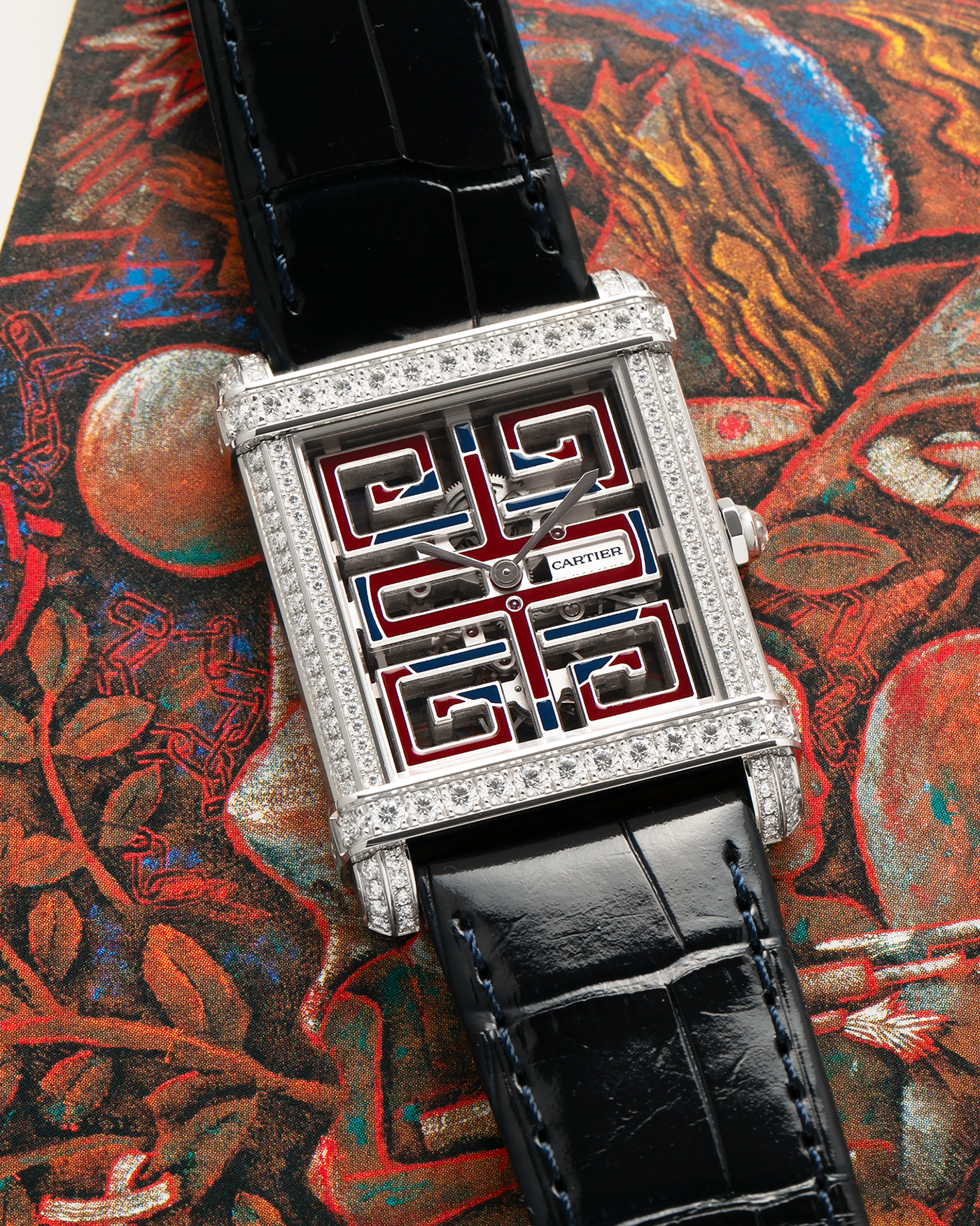 Brand: Cartier
Year: 2022
Model: Privé Tank Chinoise Skeleton, Limited Edition of 20 Pieces in this Configuration
Reference Number: CRHPI01507
Material: Platinum 950 Case, Lacquered Movement Bridges, Diamond-Setting on Case
Movement: Cartier Cal. 9627 MC, Manual-Winding
Case Dimensions: 39.5mm x 29mm x 8mm (Lug-to-Lug 40mm)
Lug Width: 21mm
Strap: Cartier Black Alligator Leather Strap with Signed and Diamond-Set Platinum 950 Tang Buckle