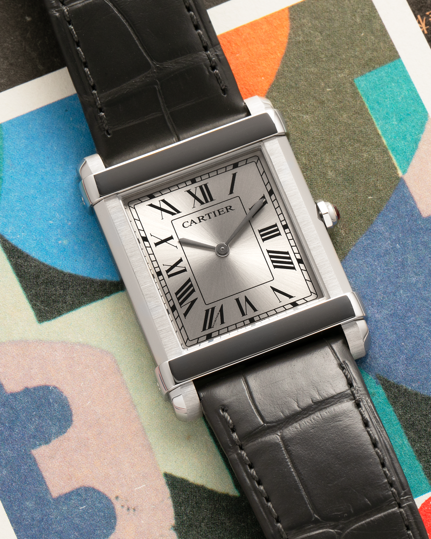 Brand: Cartier
Year: 2023
Model: Privé Tank Chinoise, Limited Edition of 150 Pieces in this Configuration
Reference Number: WGTA0074
Material: Platinum 950
Movement: Cartier Cal. 430 MC (Based on Piaget Cal. 430P), Manual-Winding
Case Dimensions: 39.5mm x 29mm x 8mm (Lug-to-Lug 40mm)
Lug Width: 21mm
Strap: Cartier Anthracite Grey Alligator Leather Strap with Signed Platinum 950 Tang Buckle