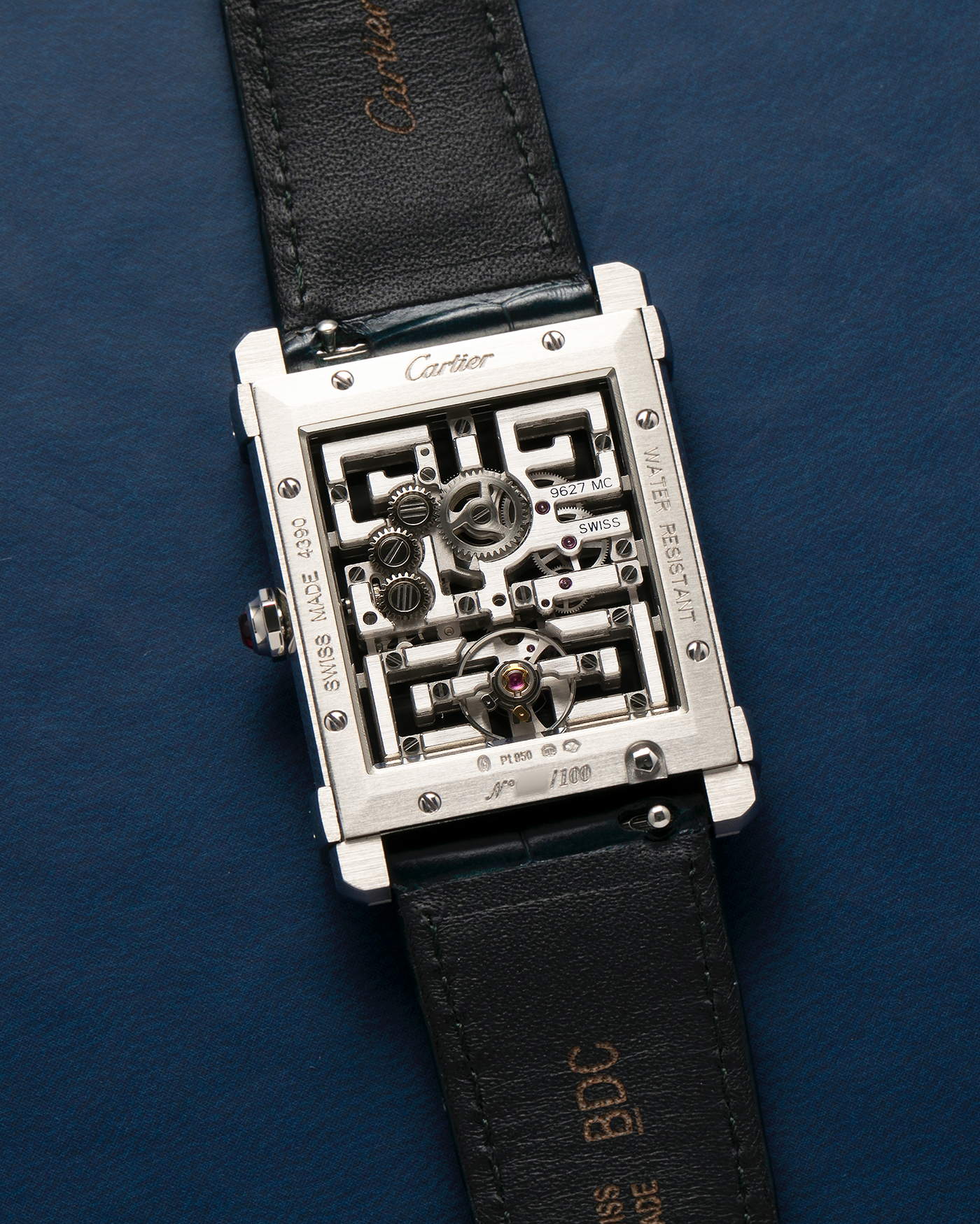 Brand: Cartier
Year: 2022
Model: Privé Tank Chinoise Skeleton, Limited Edition of 100 Pieces in this Configuration
Reference Number: CRWHTA0015
Material: Platinum 950, Lacquered Movement Bridges
Movement: Cartier Cal. 9627 MC, Manual-Winding
Case Dimensions: 39.5mm x 29mm x 8mm (40mm Lug-to-Lug)
Lug Width: 21mm
Strap: Cartier Black Alligator Leather Strap with Signed Platinum 950 Tang Buckle