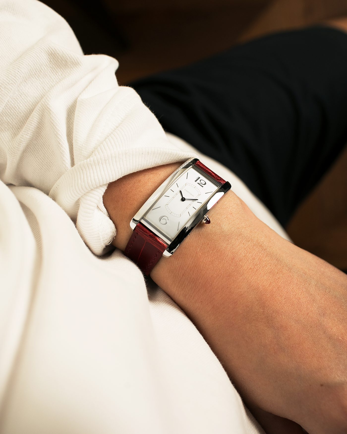Brand: Cartier
Year: 2018
Model: Privé Tank Cintrée, Limited Edition of 100 pieces (Platinum Variant)
Reference: WGTA0027
Material: Platinum 950
Movement: Cartier Cal. 8971 MC (Based on JLC Cal. 846), Manual-Winding
Case Diameter: 46.3mm x 23 mm (7.1mm Thick)
Lug Width: 16mm
Strap: Cartier Semi-Matt Grey Alligator Leather Strap with Signed Platinum Tang Buckle, Unbranded, Custom Order Red Alligator Strap