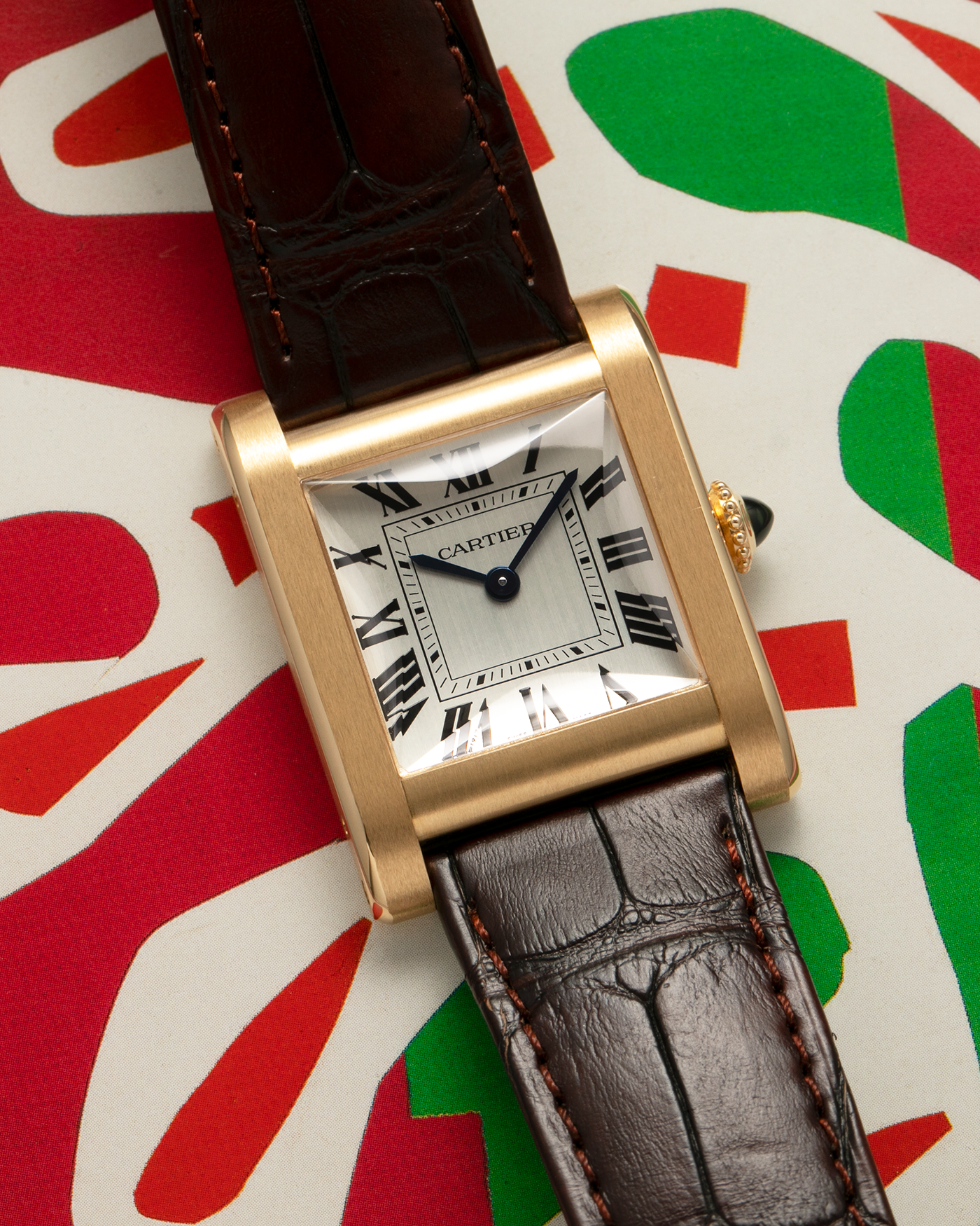 Brand: Cartier
Year: 2024
Model: Privé Tank Normale, Limited to 200 Pieces in this Combination
Reference Number: CRWGTA0108
Material: 18-carat Yellow Gold
Movement: Cartier Cal. 070 MC, Manual-Winding
Case Dimensions: 32.6mm (Lug-to-Lug) x 25.7mm
Lug Width: 19mm
Strap: Cartier Brown Alligator Leather Strap with Signed 18-carat Yellow Gold Tang Buckle